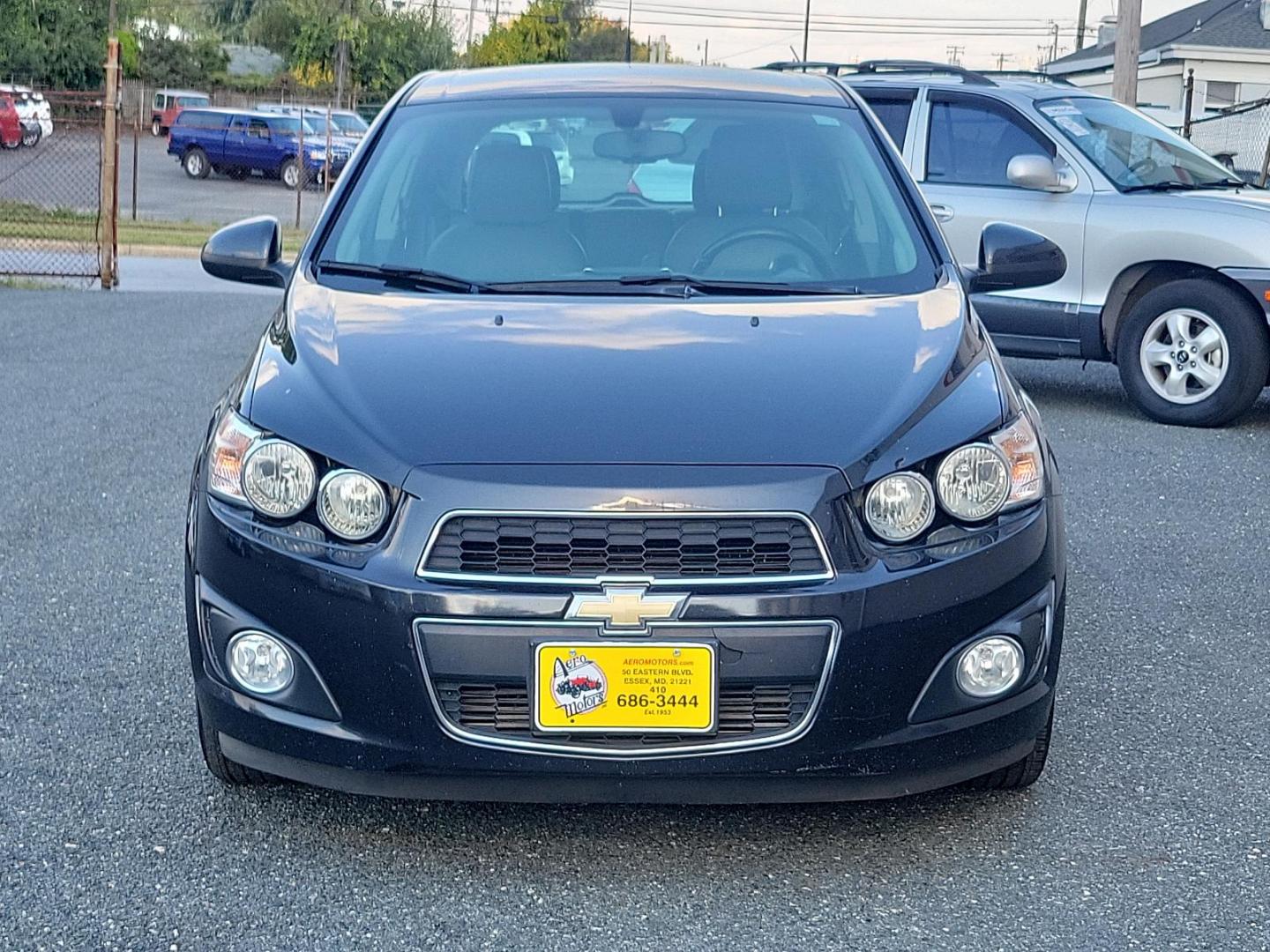 2014 Black Granite Metallic - GAR /Dark Pewter/Dark Titanium - ADP Chevrolet Sonic LTZ (1G1JE6SB3E4) with an ENGINE, ECOTEC TURBO 1.4L VARIABLE VALVE TIMING DOHC 4-CYLINDER SEQUENTIAL MFI engine, located at 50 Eastern Blvd., Essex, MD, 21221, (410) 686-3444, 39.304367, -76.484947 - Discover the outstanding 2014 Chevrolet Sonic LTZ 5-Door Hatchback Auto LTZ - an embodiment of power and style. Coated in a sleek Black Granite Metallic exterior coupled with a sophisticated Dark Pewter/Dark Titanium interior, this vehicle combines aesthetics with quality. Under the hood, nestled pe - Photo#1