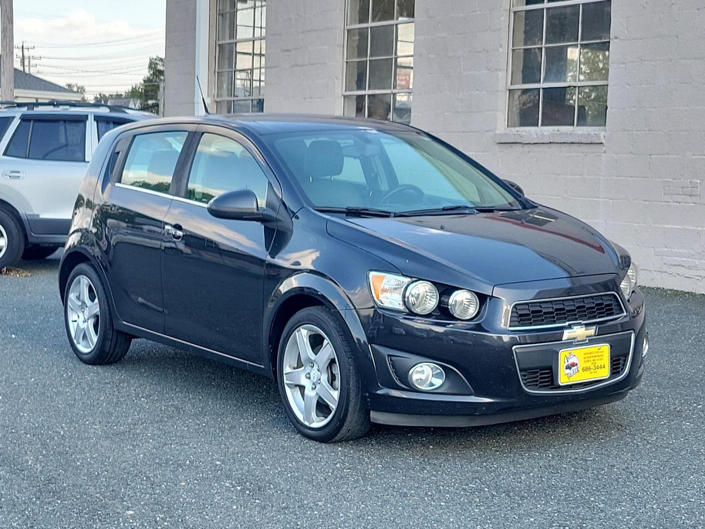 2014 Black Granite Metallic - GAR /Dark Pewter/Dark Titanium - ADP Chevrolet Sonic LTZ (1G1JE6SB3E4) with an ENGINE, ECOTEC TURBO 1.4L VARIABLE VALVE TIMING DOHC 4-CYLINDER SEQUENTIAL MFI engine, located at 50 Eastern Blvd., Essex, MD, 21221, (410) 686-3444, 39.304367, -76.484947 - Discover the outstanding 2014 Chevrolet Sonic LTZ 5-Door Hatchback Auto LTZ - an embodiment of power and style. Coated in a sleek Black Granite Metallic exterior coupled with a sophisticated Dark Pewter/Dark Titanium interior, this vehicle combines aesthetics with quality. Under the hood, nestled pe - Photo#2