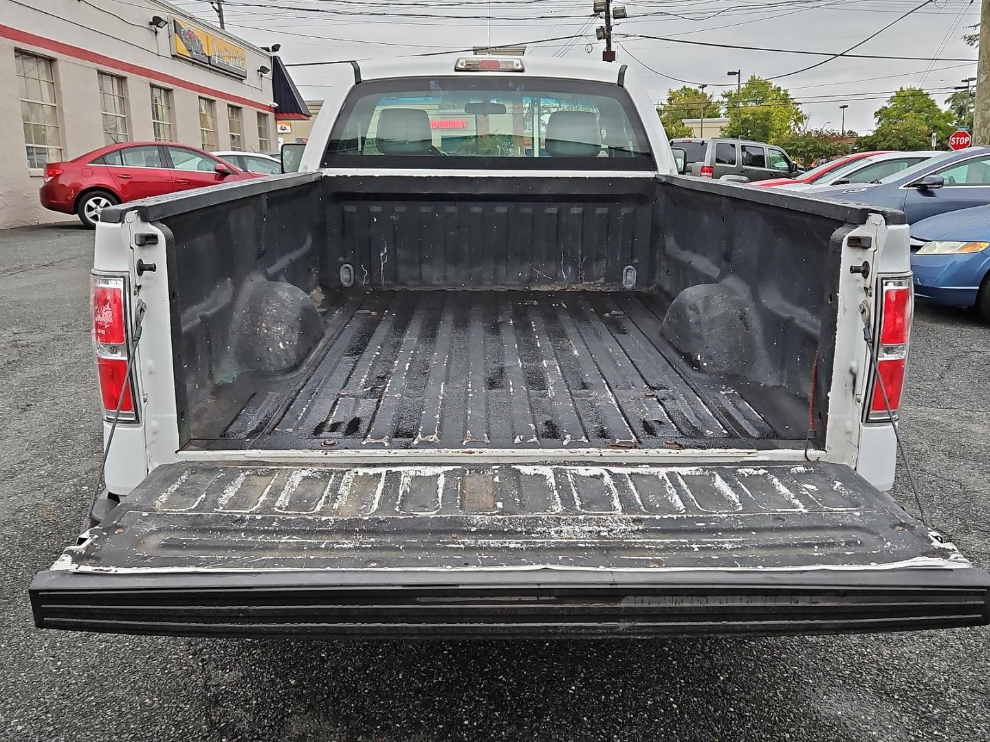 2013 Oxford White - YZ /Steel Gray - CS Ford F-150 XL (1FTMF1CM1DK) with an 3.7L V6 FFV ENGINE engine, located at 50 Eastern Blvd., Essex, MD, 21221, (410) 686-3444, 39.304367, -76.484947 - Presenting the robust 2013 Ford F-150 XL 2WD Regular Cab in a majestic Oxford White - YZ exterior finish. Its spacious and comfortable interior is adorned in a classy steel gray - CS shade, guaranteeing a stylish journey every time. At the heart of this reliable pickup truck is its 3.7L V6 FFV engin - Photo#24