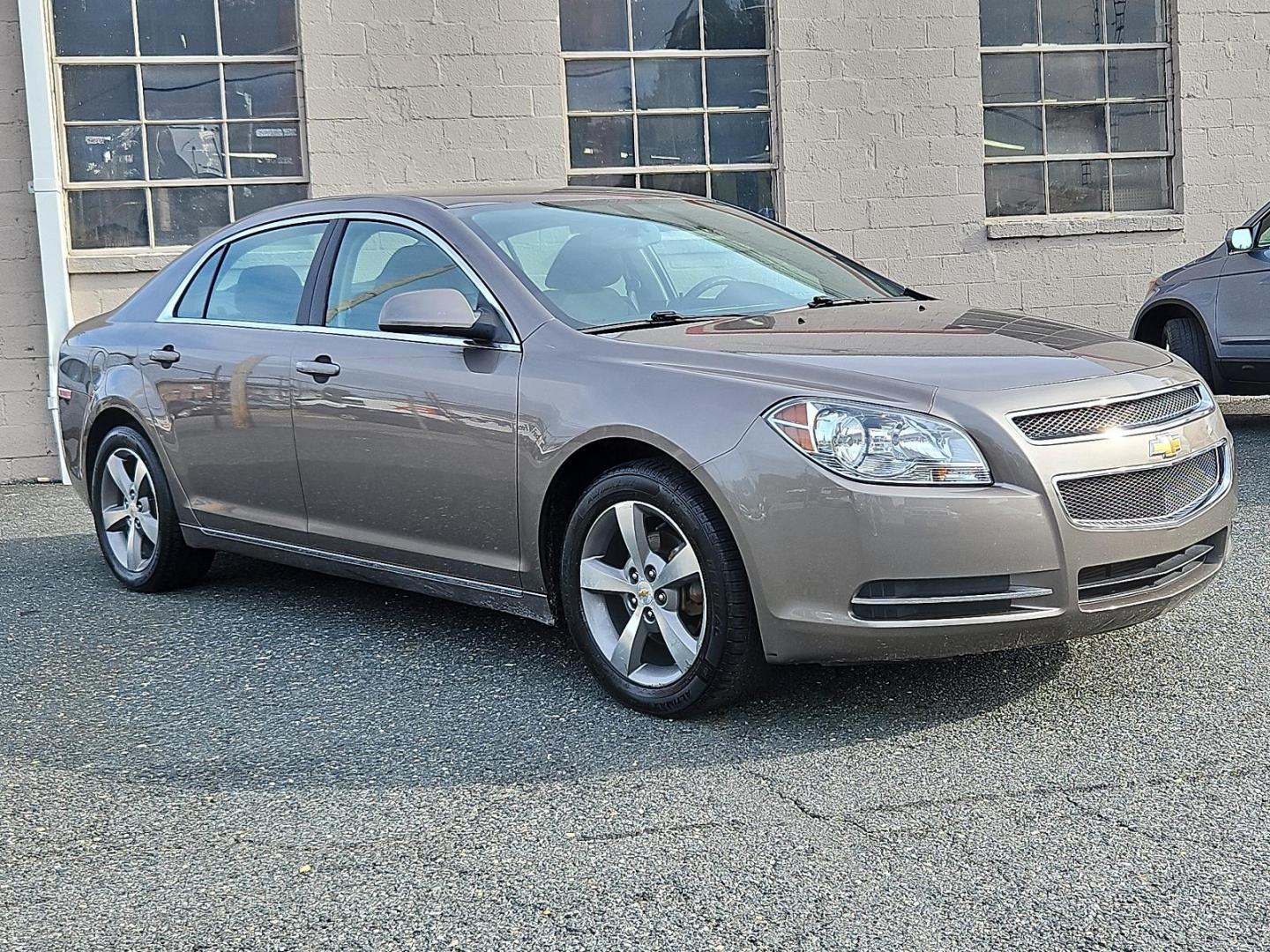 2011 Mocha Steel Metallic - GHA /Ebony - 19B Chevrolet Malibu LT w/1LT (1G1ZC5E10BF) with an ENGINE, ECOTEC 2.4L DOHC, 16-VALVE, 4-CYLINDER VARIABLE VALVE TIMING MFI engine, located at 50 Eastern Blvd., Essex, MD, 21221, (410) 686-3444, 39.304367, -76.484947 - Experience premium on-road performance with our 2011 Chevrolet Malibu LT w/1LT 4dr sdn lt w/1lt. Presented in a classy mocha steel metallic exterior finish, this car sports a polished and professional look. The interior delivers comfort and luxury, boasting a striking ebony design. Under the hood, y - Photo#2