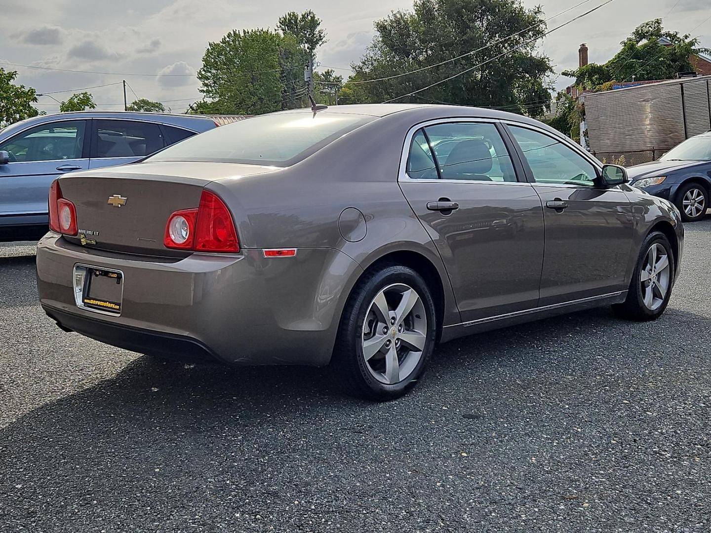 2011 Mocha Steel Metallic - GHA /Ebony - 19B Chevrolet Malibu LT w/1LT (1G1ZC5E10BF) with an ENGINE, ECOTEC 2.4L DOHC, 16-VALVE, 4-CYLINDER VARIABLE VALVE TIMING MFI engine, located at 50 Eastern Blvd., Essex, MD, 21221, (410) 686-3444, 39.304367, -76.484947 - Experience premium on-road performance with our 2011 Chevrolet Malibu LT w/1LT 4dr sdn lt w/1lt. Presented in a classy mocha steel metallic exterior finish, this car sports a polished and professional look. The interior delivers comfort and luxury, boasting a striking ebony design. Under the hood, y - Photo#3