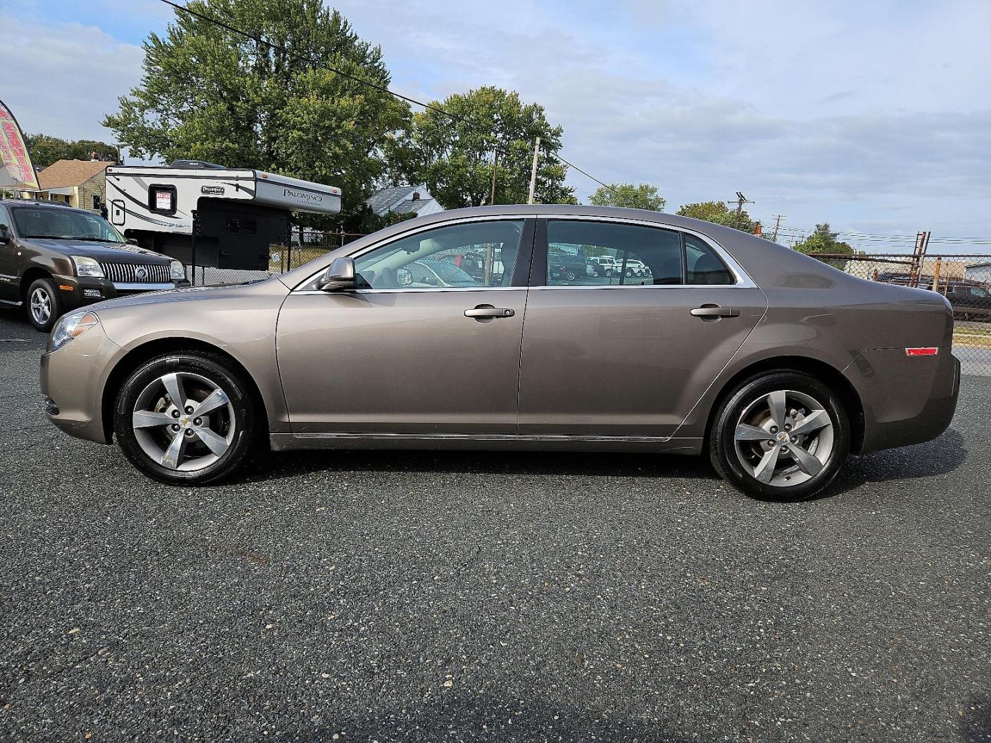 2011 Mocha Steel Metallic - GHA /Ebony - 19B Chevrolet Malibu LT w/1LT (1G1ZC5E10BF) with an ENGINE, ECOTEC 2.4L DOHC, 16-VALVE, 4-CYLINDER VARIABLE VALVE TIMING MFI engine, located at 50 Eastern Blvd., Essex, MD, 21221, (410) 686-3444, 39.304367, -76.484947 - Experience premium on-road performance with our 2011 Chevrolet Malibu LT w/1LT 4dr sdn lt w/1lt. Presented in a classy mocha steel metallic exterior finish, this car sports a polished and professional look. The interior delivers comfort and luxury, boasting a striking ebony design. Under the hood, y - Photo#6