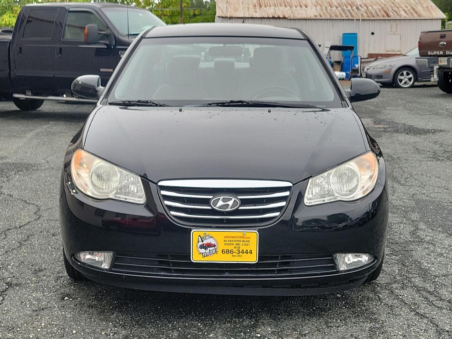 2010 Black Noir Pearl - NKA /Gray - 9Y Hyundai Elantra GLS PZEV (KMHDU4AD9AU) with an 2.0L DOHC CVVT 16-valve I4 engine engine, located at 50 Eastern Blvd., Essex, MD, 21221, (410) 686-3444, 39.304367, -76.484947 - Presenting a splendid 2010 Hyundai Elantra GLS PZEV 4dr Sdn auto GLS PZEV, a sleek, compact sedan that perfectly balances style and practicality. Coated in a captivating Black Noir Pearl exterior, this car is a sophisticated aesthetic statement on wheels. The contemporary gray interior wonderfully c - Photo#1