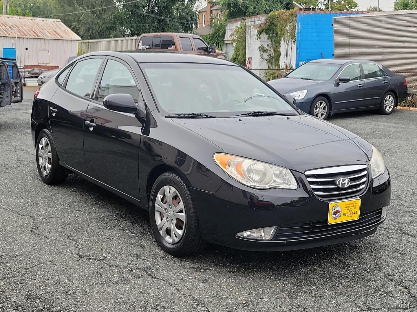 2010 Black Noir Pearl - NKA /Gray - 9Y Hyundai Elantra GLS PZEV (KMHDU4AD9AU) with an 2.0L DOHC CVVT 16-valve I4 engine engine, located at 50 Eastern Blvd., Essex, MD, 21221, (410) 686-3444, 39.304367, -76.484947 - Presenting a splendid 2010 Hyundai Elantra GLS PZEV 4dr Sdn auto GLS PZEV, a sleek, compact sedan that perfectly balances style and practicality. Coated in a captivating Black Noir Pearl exterior, this car is a sophisticated aesthetic statement on wheels. The contemporary gray interior wonderfully c - Photo#2