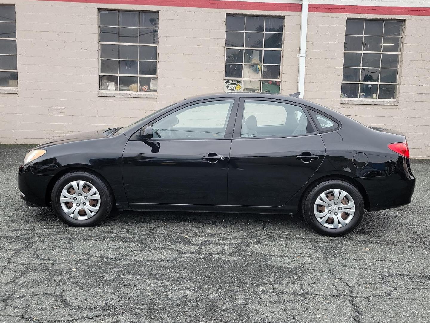 2010 Black Noir Pearl - NKA /Gray - 9Y Hyundai Elantra GLS PZEV (KMHDU4AD9AU) with an 2.0L DOHC CVVT 16-valve I4 engine engine, located at 50 Eastern Blvd., Essex, MD, 21221, (410) 686-3444, 39.304367, -76.484947 - Presenting a splendid 2010 Hyundai Elantra GLS PZEV 4dr Sdn auto GLS PZEV, a sleek, compact sedan that perfectly balances style and practicality. Coated in a captivating Black Noir Pearl exterior, this car is a sophisticated aesthetic statement on wheels. The contemporary gray interior wonderfully c - Photo#6