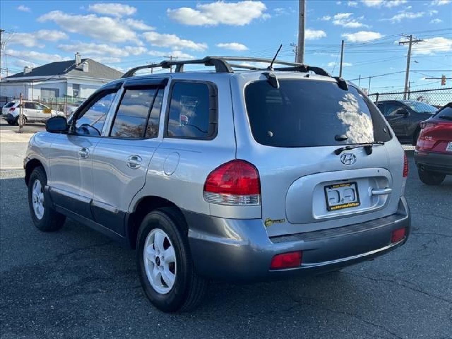 2005 Silver Hyundai SANTA FE GLS (KM8SC73D15U) with an 2.7L 6 Cylinder Fuel Injected engine, 4X4 transmission, located at 50 Eastern Blvd., Essex, MD, 21221, (410) 686-3444, 39.304367, -76.484947 - Photo#2