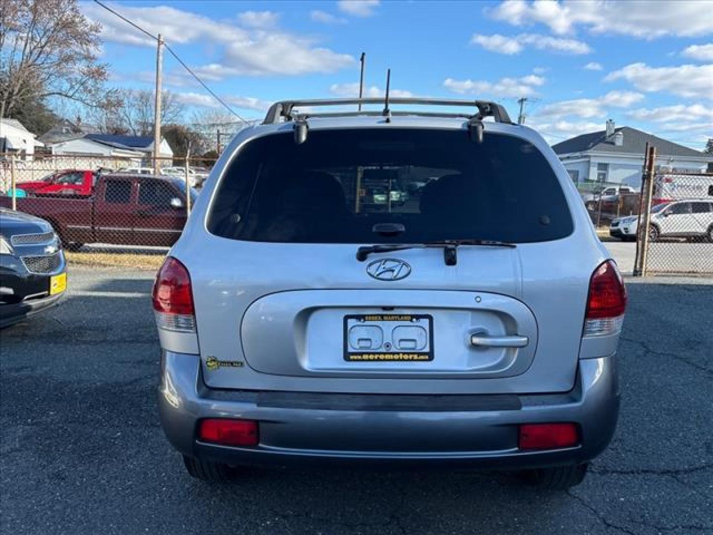 2005 Silver Hyundai SANTA FE GLS (KM8SC73D15U) with an 2.7L 6 Cylinder Fuel Injected engine, 4X4 transmission, located at 50 Eastern Blvd., Essex, MD, 21221, (410) 686-3444, 39.304367, -76.484947 - Photo#4