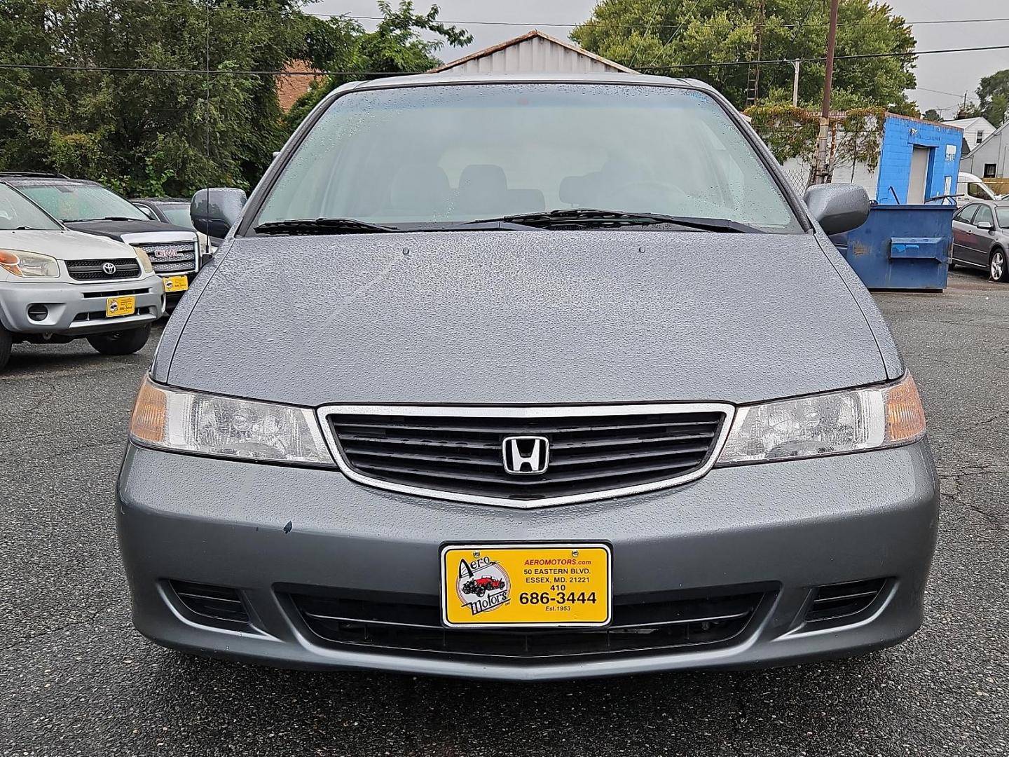 2001 Dark Emerald Pearl - /Quartz - Honda Odyssey EX (2HKRL18681H) with an 3.5L SOHC MPFI 24-valve VTEC V6 engine engine, located at 50 Eastern Blvd., Essex, MD, 21221, (410) 686-3444, 39.304367, -76.484947 - Introducing the 2001 Honda Odyssey EX, a sleek and versatile 7-passenger minivan covered in a unique and attractive green exterior that turns heads on the street. Underneath the hood lies a robust 3.5L SOHC MPFI 24-valve VTEC V6 engine, offering a balanced blend of power and efficiency. The Odyssey - Photo#1