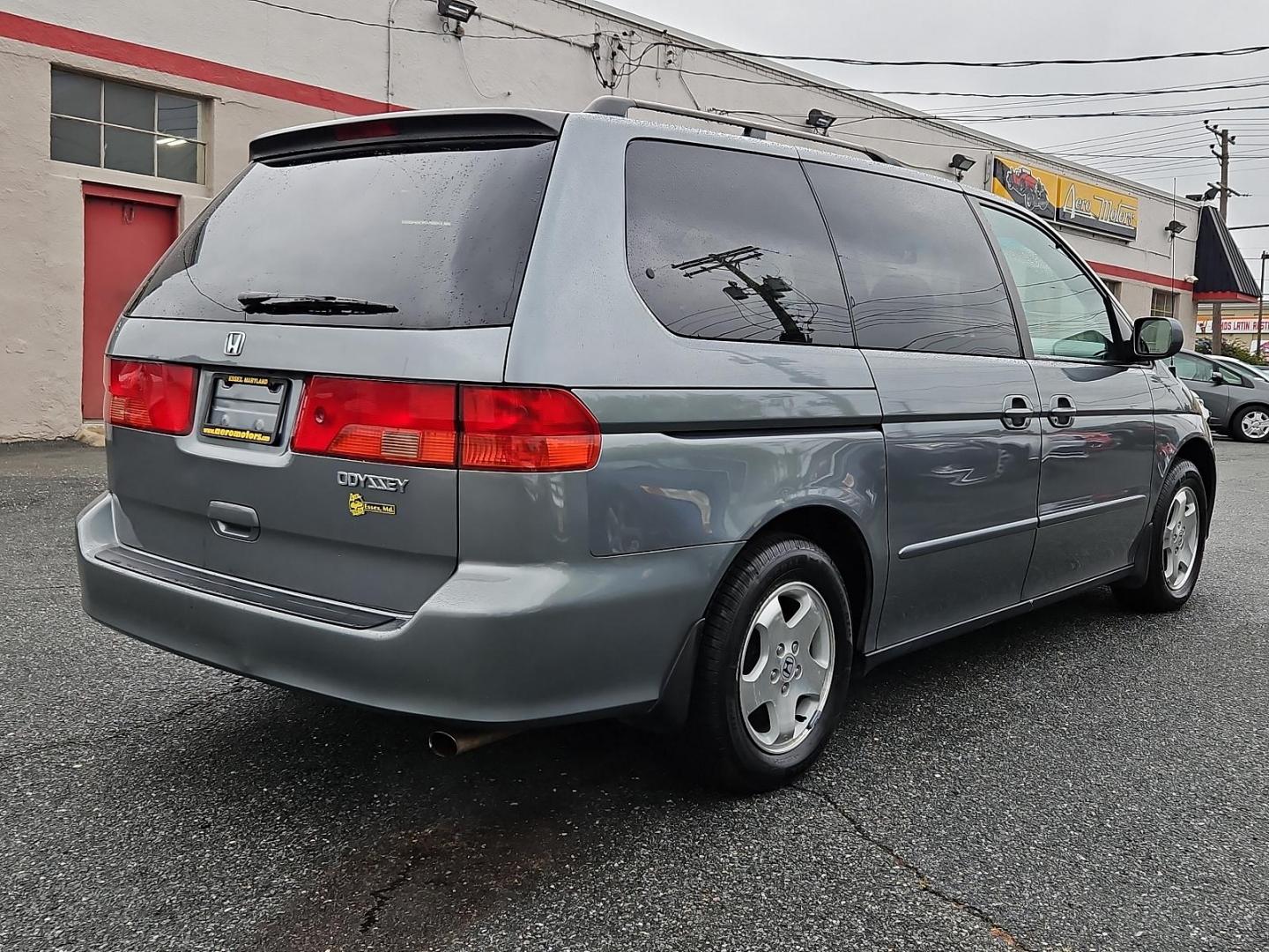 2001 Dark Emerald Pearl - /Quartz - Honda Odyssey EX (2HKRL18681H) with an 3.5L SOHC MPFI 24-valve VTEC V6 engine engine, located at 50 Eastern Blvd., Essex, MD, 21221, (410) 686-3444, 39.304367, -76.484947 - Introducing the 2001 Honda Odyssey EX, a sleek and versatile 7-passenger minivan covered in a unique and attractive green exterior that turns heads on the street. Underneath the hood lies a robust 3.5L SOHC MPFI 24-valve VTEC V6 engine, offering a balanced blend of power and efficiency. The Odyssey - Photo#3