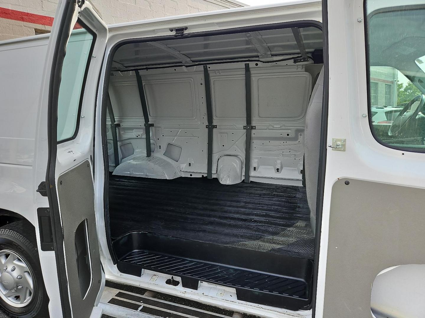 2012 Oxford White - YZ /Medium Flint - CE Ford Econoline Cargo Van Commercial (1FTNE2EWXCD) with an 4.6L SOHC EFI FLEX FUEL V8 ENGINE engine, located at 50 Eastern Blvd., Essex, MD, 21221, (410) 686-3444, 39.304367, -76.484947 - Introducing the robust and resilient 2012 Ford Econoline Cargo Van E-250 Commercial, a versatile and powerful workhorse awaiting discovery. This well-kept heavy-duty van boasts an energetic 4.6L SOHC EFI Flex Fuel V8 engine, reliably designed to accommodate heavy workloads without compromising perfo - Photo#9