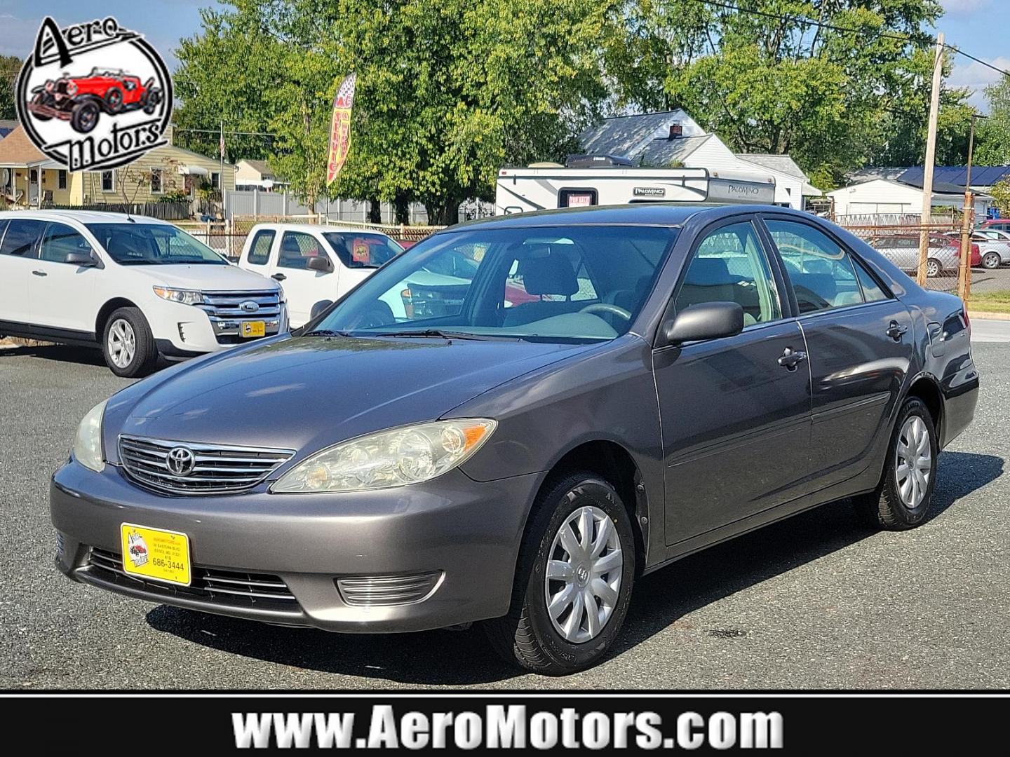 2006 Phantom Gray Pearl - 1E3 /Stone - 95 Toyota Camry LE (4T1BE32K86U) with an 2.4L DOHC SEFI 16-valve 4-cyl engine w/VVT-i engine, located at 50 Eastern Blvd., Essex, MD, 21221, (410) 686-3444, 39.304367, -76.484947 - Experience the perfect blend of efficiency and reliability with this 2006 Toyota Camry LE. Cloaked in a sleek Phantom Gray Pearl exterior, this sedan offers a spacious interior dressed in Stone - 95 hues, exuding style and comfort simultaneously. Under the hood, a hardy 2.4L DOHC SEFI 16-valve 4-Cyl - Photo#0