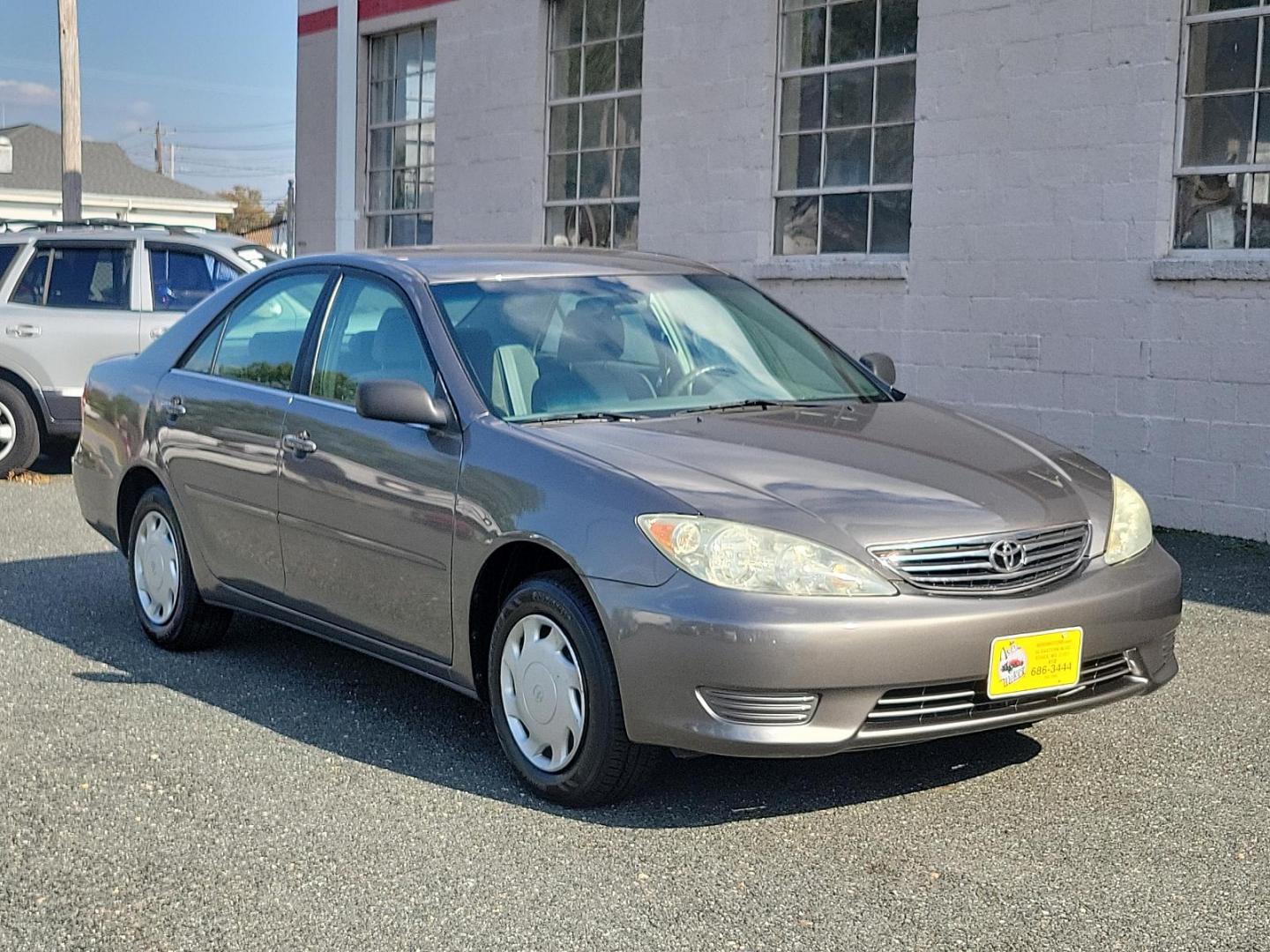 2006 Phantom Gray Pearl - 1E3 /Stone - 95 Toyota Camry LE (4T1BE32K86U) with an 2.4L DOHC SEFI 16-valve 4-cyl engine w/VVT-i engine, located at 50 Eastern Blvd., Essex, MD, 21221, (410) 686-3444, 39.304367, -76.484947 - Experience the perfect blend of efficiency and reliability with this 2006 Toyota Camry LE. Cloaked in a sleek Phantom Gray Pearl exterior, this sedan offers a spacious interior dressed in Stone - 95 hues, exuding style and comfort simultaneously. Under the hood, a hardy 2.4L DOHC SEFI 16-valve 4-Cyl - Photo#2