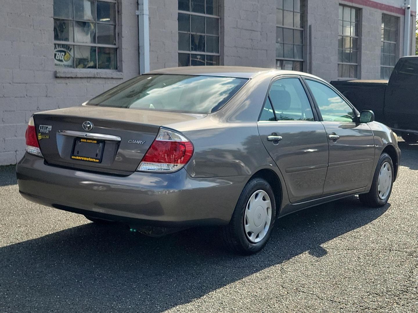 2006 Phantom Gray Pearl - 1E3 /Stone - 95 Toyota Camry LE (4T1BE32K86U) with an 2.4L DOHC SEFI 16-valve 4-cyl engine w/VVT-i engine, located at 50 Eastern Blvd., Essex, MD, 21221, (410) 686-3444, 39.304367, -76.484947 - Experience the perfect blend of efficiency and reliability with this 2006 Toyota Camry LE. Cloaked in a sleek Phantom Gray Pearl exterior, this sedan offers a spacious interior dressed in Stone - 95 hues, exuding style and comfort simultaneously. Under the hood, a hardy 2.4L DOHC SEFI 16-valve 4-Cyl - Photo#3