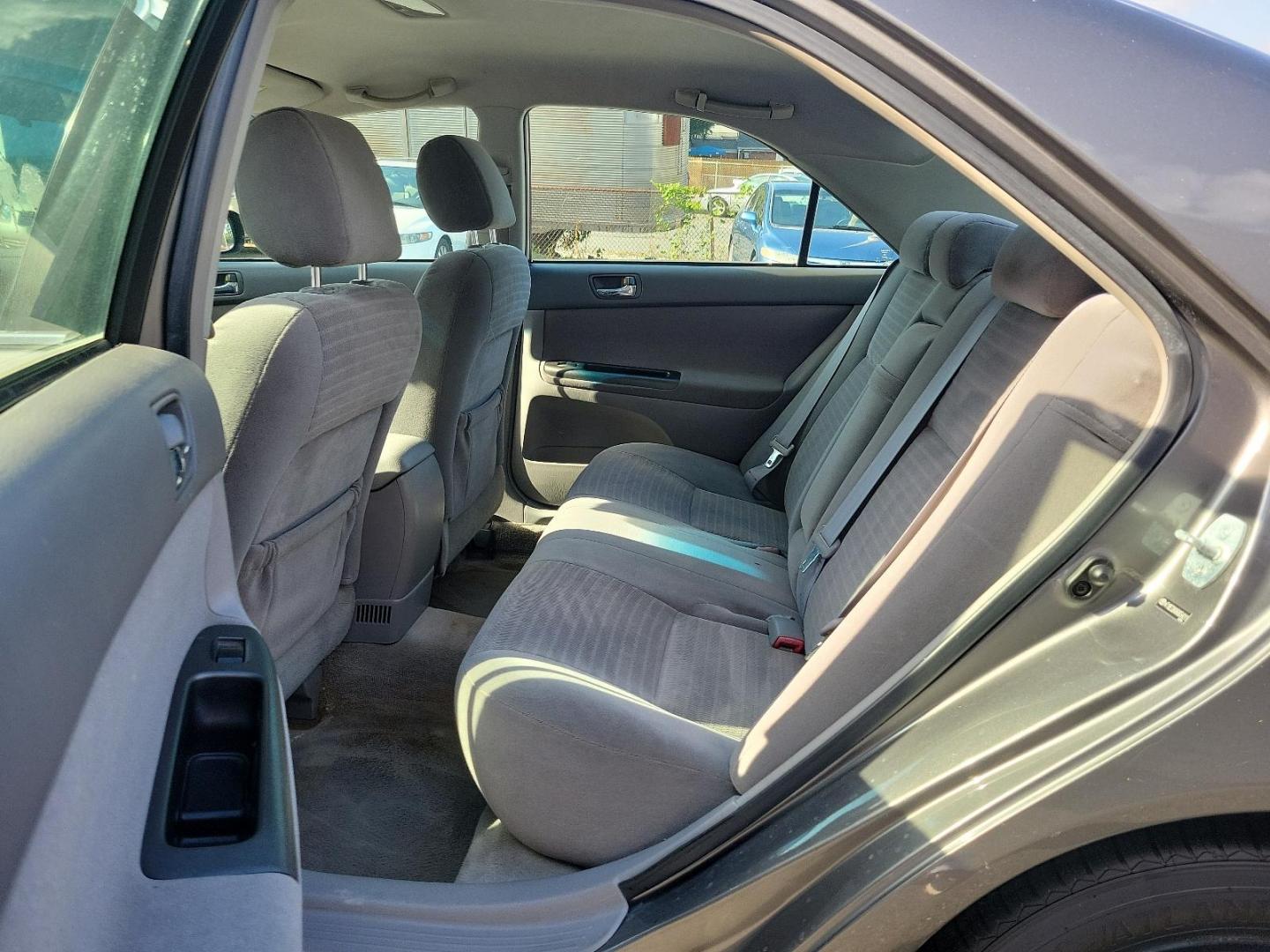 2006 Phantom Gray Pearl - 1E3 /Stone - 95 Toyota Camry LE (4T1BE32K86U) with an 2.4L DOHC SEFI 16-valve 4-cyl engine w/VVT-i engine, located at 50 Eastern Blvd., Essex, MD, 21221, (410) 686-3444, 39.304367, -76.484947 - Experience the perfect blend of efficiency and reliability with this 2006 Toyota Camry LE. Cloaked in a sleek Phantom Gray Pearl exterior, this sedan offers a spacious interior dressed in Stone - 95 hues, exuding style and comfort simultaneously. Under the hood, a hardy 2.4L DOHC SEFI 16-valve 4-Cyl - Photo#8