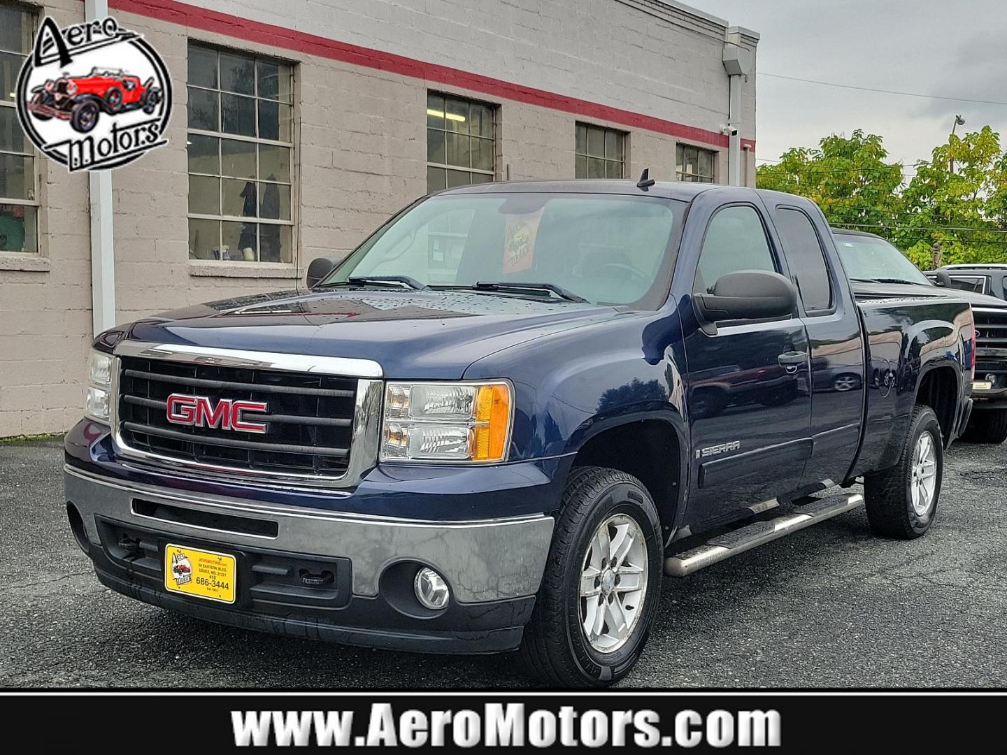 2009 Midnight Blue Metallic - 37U /Ebony - 193 GMC Sierra 1500 SLE (1GTEC29J49Z) with an ENGINE, VORTEC 5.3L V8 SFI WITH ACTIVE FUEL MANAGEMENT (315 HP [234.9 KW] @ 5200 RPM, 338 LB-FT OF TORQUE [456.3 NM] @ 4400 RPM), IRON BLOCK engine, located at 50 Eastern Blvd., Essex, MD, 21221, (410) 686-3444, 39.304367, -76.484947 - Experience the remarkable blend of power and elegance with this 2009 GMC Sierra 1500 SLE! Resplendent in a striking Midnight Blue Metallic exterior, it commands attention at every turn. Inside, its ebony interior exudes class and lavish comfort. Under the hood, it packs a Vortec 5.3L V8 SFI engine w - Photo#0