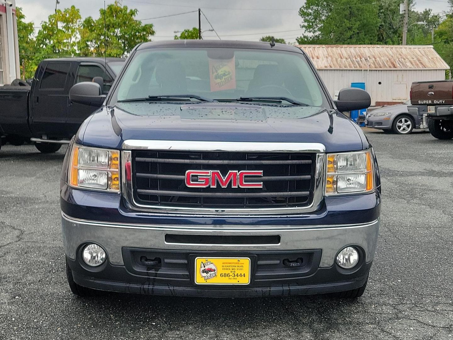 2009 Midnight Blue Metallic - 37U /Ebony - 193 GMC Sierra 1500 SLE (1GTEC29J49Z) with an ENGINE, VORTEC 5.3L V8 SFI WITH ACTIVE FUEL MANAGEMENT (315 HP [234.9 KW] @ 5200 RPM, 338 LB-FT OF TORQUE [456.3 NM] @ 4400 RPM), IRON BLOCK engine, located at 50 Eastern Blvd., Essex, MD, 21221, (410) 686-3444, 39.304367, -76.484947 - Experience the remarkable blend of power and elegance with this 2009 GMC Sierra 1500 SLE! Resplendent in a striking Midnight Blue Metallic exterior, it commands attention at every turn. Inside, its ebony interior exudes class and lavish comfort. Under the hood, it packs a Vortec 5.3L V8 SFI engine w - Photo#1