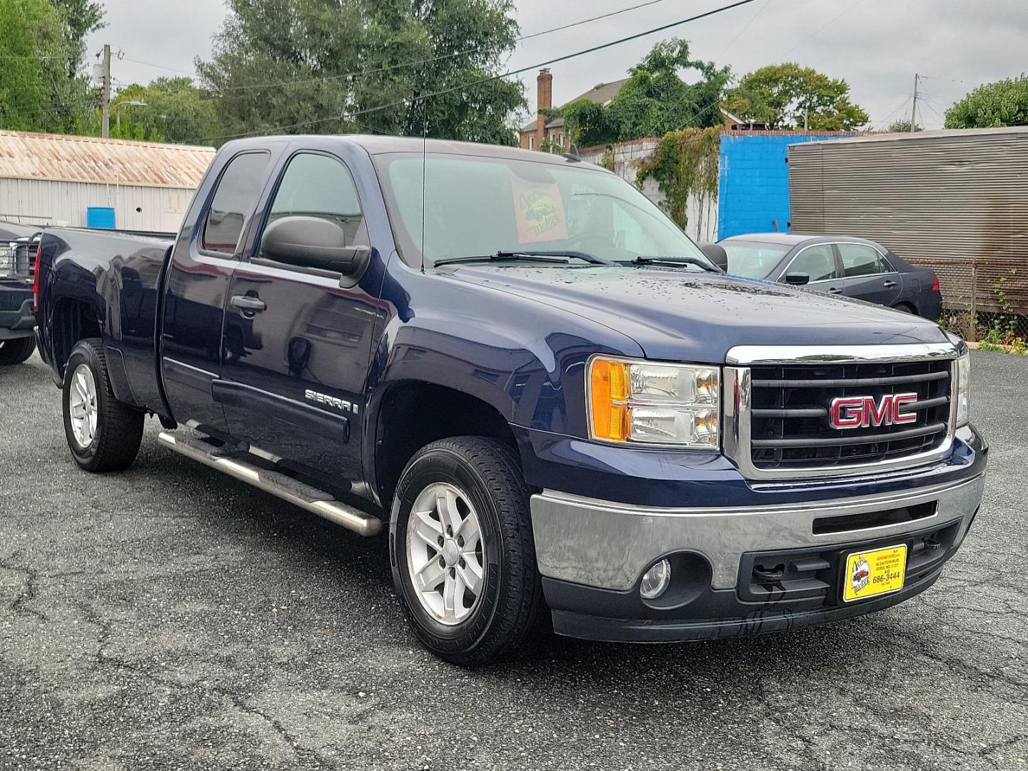 2009 Midnight Blue Metallic - 37U /Ebony - 193 GMC Sierra 1500 SLE (1GTEC29J49Z) with an ENGINE, VORTEC 5.3L V8 SFI WITH ACTIVE FUEL MANAGEMENT (315 HP [234.9 KW] @ 5200 RPM, 338 LB-FT OF TORQUE [456.3 NM] @ 4400 RPM), IRON BLOCK engine, located at 50 Eastern Blvd., Essex, MD, 21221, (410) 686-3444, 39.304367, -76.484947 - Experience the remarkable blend of power and elegance with this 2009 GMC Sierra 1500 SLE! Resplendent in a striking Midnight Blue Metallic exterior, it commands attention at every turn. Inside, its ebony interior exudes class and lavish comfort. Under the hood, it packs a Vortec 5.3L V8 SFI engine w - Photo#2