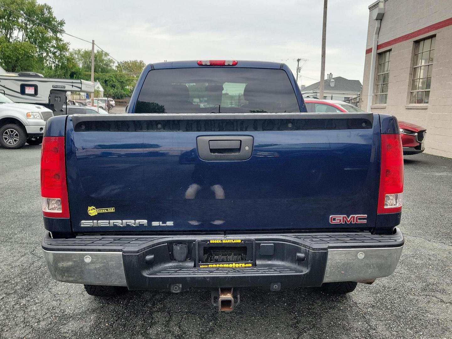 2009 Midnight Blue Metallic - 37U /Ebony - 193 GMC Sierra 1500 SLE (1GTEC29J49Z) with an ENGINE, VORTEC 5.3L V8 SFI WITH ACTIVE FUEL MANAGEMENT (315 HP [234.9 KW] @ 5200 RPM, 338 LB-FT OF TORQUE [456.3 NM] @ 4400 RPM), IRON BLOCK engine, located at 50 Eastern Blvd., Essex, MD, 21221, (410) 686-3444, 39.304367, -76.484947 - Experience the remarkable blend of power and elegance with this 2009 GMC Sierra 1500 SLE! Resplendent in a striking Midnight Blue Metallic exterior, it commands attention at every turn. Inside, its ebony interior exudes class and lavish comfort. Under the hood, it packs a Vortec 5.3L V8 SFI engine w - Photo#4