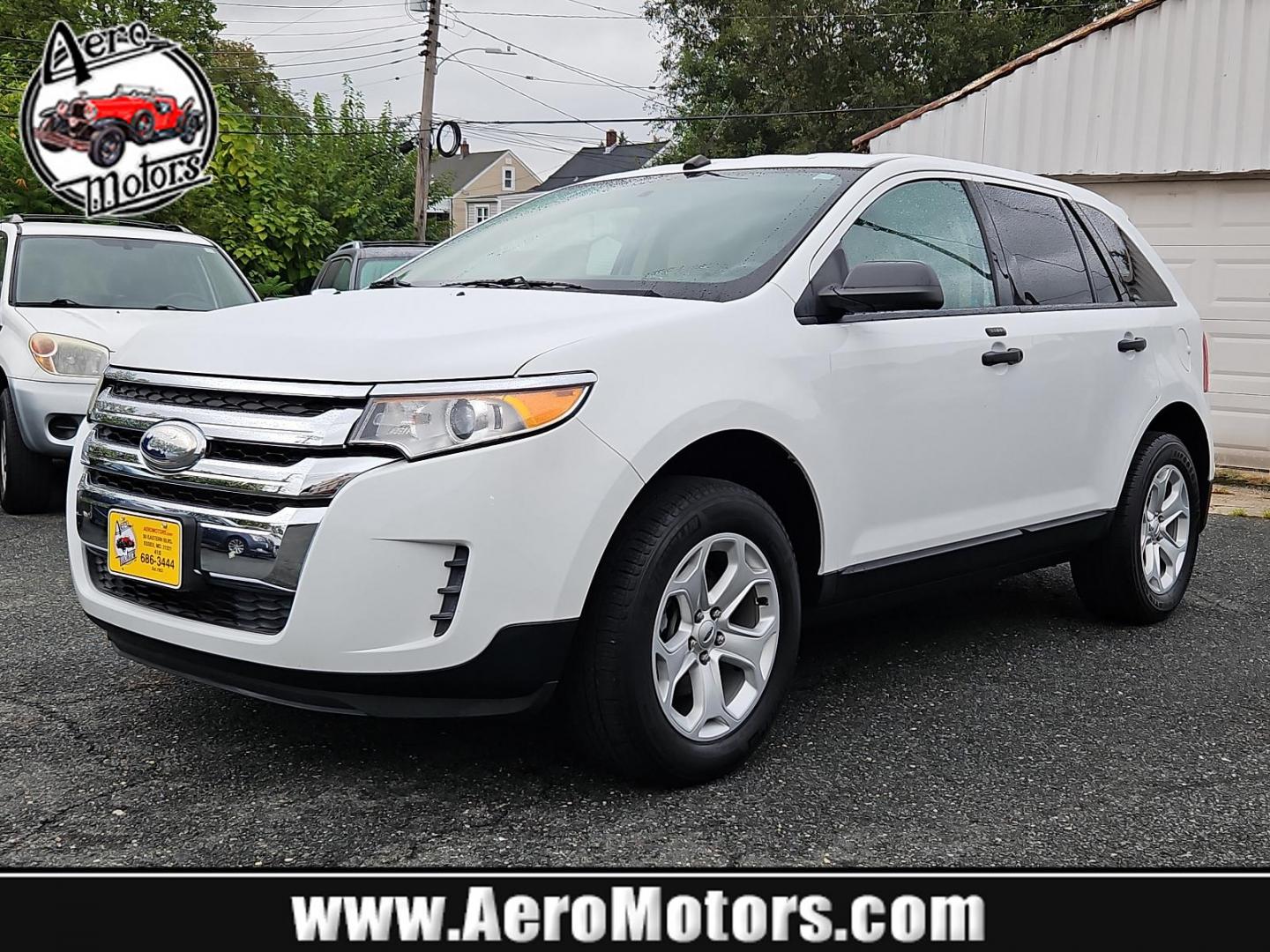 2014 Oxford White - YZ /Medium Light Stone - EL Ford Edge SE (2FMDK4GC8EB) with an ENGINE: 3.5L TI-VCT V6 engine, located at 50 Eastern Blvd., Essex, MD, 21221, (410) 686-3444, 39.304367, -76.484947 - Experience the pinnacle of practicality and performance with our 2014 Ford Edge SE 4dr AWD, adorned with a sleek white exterior. This robust SUV boasts a potent 3.5L Ti-VCT V6 engine - legendary for its reliability, smooth handling, and impressive power. The intelligent all-wheel drive system delive - Photo#0