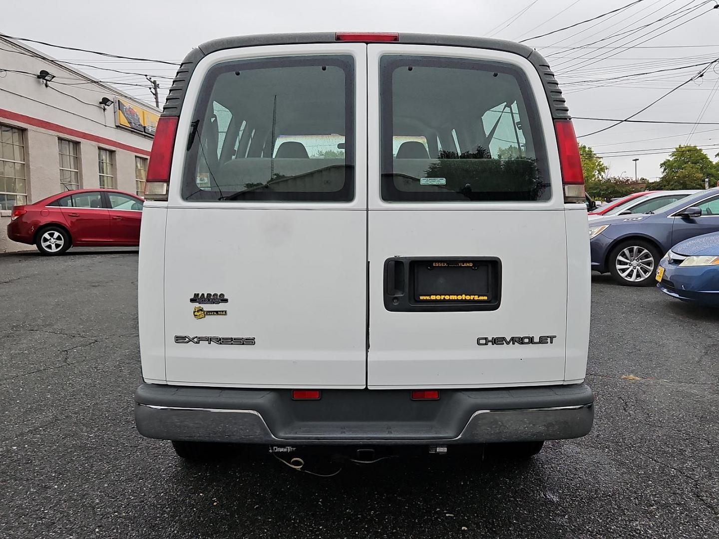 1999 Summit White - 50U /Medium Gray - 92 Chevrolet Express Van (1GAHG39R0X1) with an HD 5.7L (350) SFI V8 VORTEC ENGINE engine, located at 50 Eastern Blvd., Essex, MD, 21221, (410) 686-3444, 39.304367, -76.484947 - Meet the 1999 Chevrolet Express Van 3500, an absolute classic exuding supreme charm. It sports a sleek Summit White - 50U exterior trimmed with a stylish Medium Gray - 92 interior, a timeless color scheme that promises a striking road presence. Nestled under the hood is a robust HD 5.7L (350) SFI V8 - Photo#4