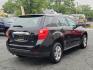 2011 Black - GBA /Light Titanium/Jet Black - AFI Chevrolet Equinox LS (2CNFLCEC8B6) with an ENGINE, 2.4L DOHC, 4-CYLINDER SIDI (SPARK IGNITION DIRECT INJECTION) engine, located at 50 Eastern Blvd., Essex, MD, 21221, (410) 686-3444, 39.304367, -76.484947 - Discover the 2011 Chevrolet Equinox LS AWD 4DR LS, a powerhouse of performance, versatility and style. Decked out in a classy black exterior, the Equinox LS leaves an unforgettable impression on every road it conquers. Inside, the light titanium/jet-black interior of this SUV delivers an immersive, - Photo#3