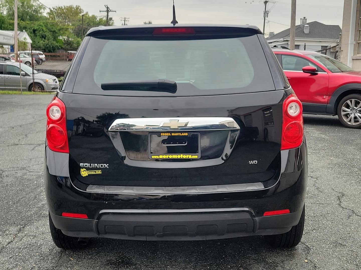 2011 Black - GBA /Light Titanium/Jet Black - AFI Chevrolet Equinox LS (2CNFLCEC8B6) with an ENGINE, 2.4L DOHC, 4-CYLINDER SIDI (SPARK IGNITION DIRECT INJECTION) engine, located at 50 Eastern Blvd., Essex, MD, 21221, (410) 686-3444, 39.304367, -76.484947 - Discover the 2011 Chevrolet Equinox LS AWD 4DR LS, a powerhouse of performance, versatility and style. Decked out in a classy black exterior, the Equinox LS leaves an unforgettable impression on every road it conquers. Inside, the light titanium/jet-black interior of this SUV delivers an immersive, - Photo#4