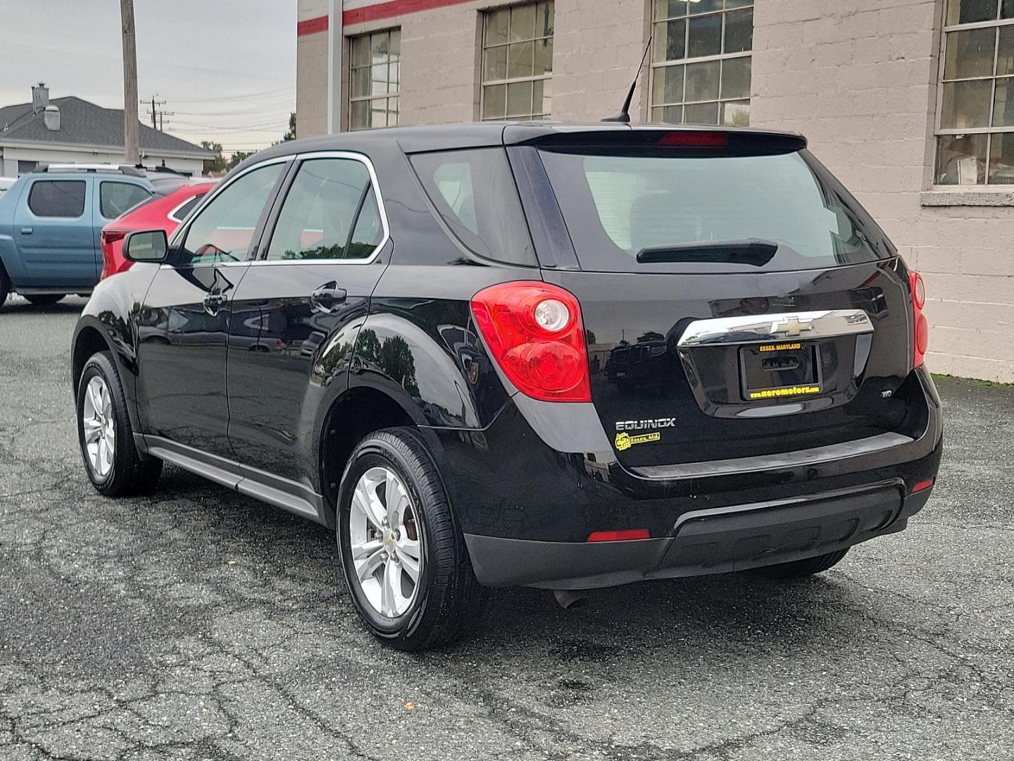 2011 Black - GBA /Light Titanium/Jet Black - AFI Chevrolet Equinox LS (2CNFLCEC8B6) with an ENGINE, 2.4L DOHC, 4-CYLINDER SIDI (SPARK IGNITION DIRECT INJECTION) engine, located at 50 Eastern Blvd., Essex, MD, 21221, (410) 686-3444, 39.304367, -76.484947 - Discover the 2011 Chevrolet Equinox LS AWD 4DR LS, a powerhouse of performance, versatility and style. Decked out in a classy black exterior, the Equinox LS leaves an unforgettable impression on every road it conquers. Inside, the light titanium/jet-black interior of this SUV delivers an immersive, - Photo#5