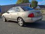 2006 Radium Metallic - KV9 /Taupe - C Nissan Sentra 1.8 S (3N1CB51D86L) with an 1.8L SMPI DOHC 16-valve 4-cyl engine engine, located at 50 Eastern Blvd., Essex, MD, 21221, (410) 686-3444, 39.304367, -76.484947 - Discover our exclusive 2006 Nissan Sentra 1.8 S. Designed to deliver performance, comfort, and style, this 4-dr sedan features an all-powerful 1.8L SMPI DOHC 16-valve 4-cylinder engine and an automatic transmission, ensuring a smooth and responsive ride. Wrapped in a majestic Radium Metallic exterio - Photo#5