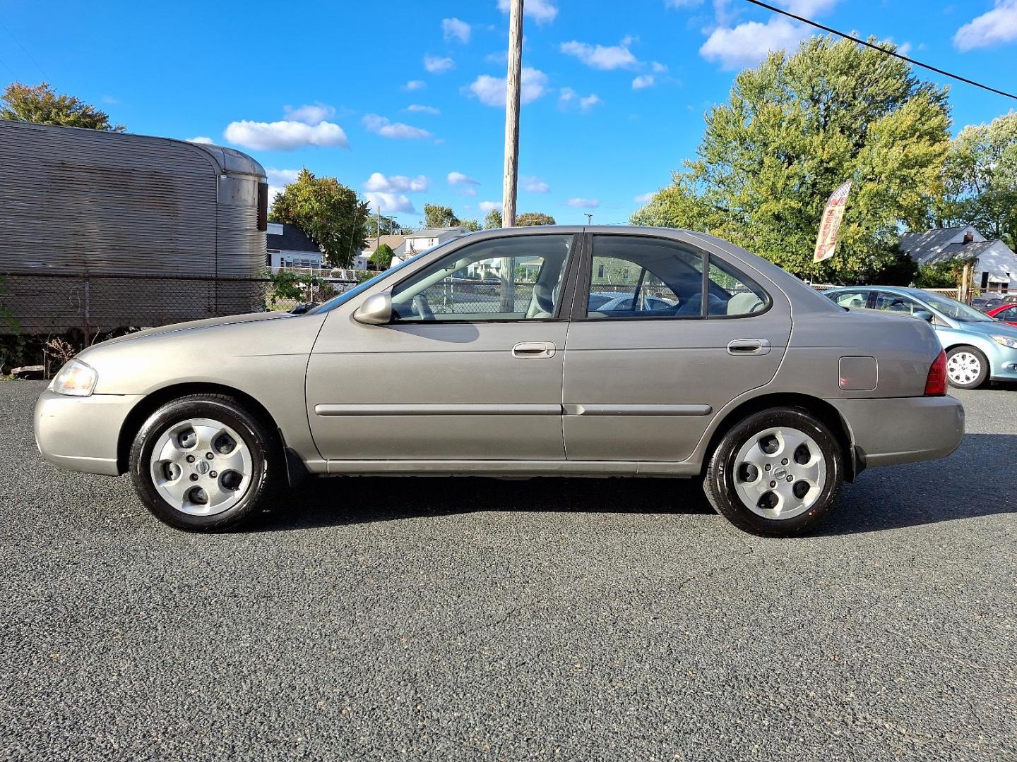 2006 Radium Metallic - KV9 /Taupe - C Nissan Sentra 1.8 S (3N1CB51D86L) with an 1.8L SMPI DOHC 16-valve 4-cyl engine engine, located at 50 Eastern Blvd., Essex, MD, 21221, (410) 686-3444, 39.304367, -76.484947 - Discover our exclusive 2006 Nissan Sentra 1.8 S. Designed to deliver performance, comfort, and style, this 4-dr sedan features an all-powerful 1.8L SMPI DOHC 16-valve 4-cylinder engine and an automatic transmission, ensuring a smooth and responsive ride. Wrapped in a majestic Radium Metallic exterio - Photo#6