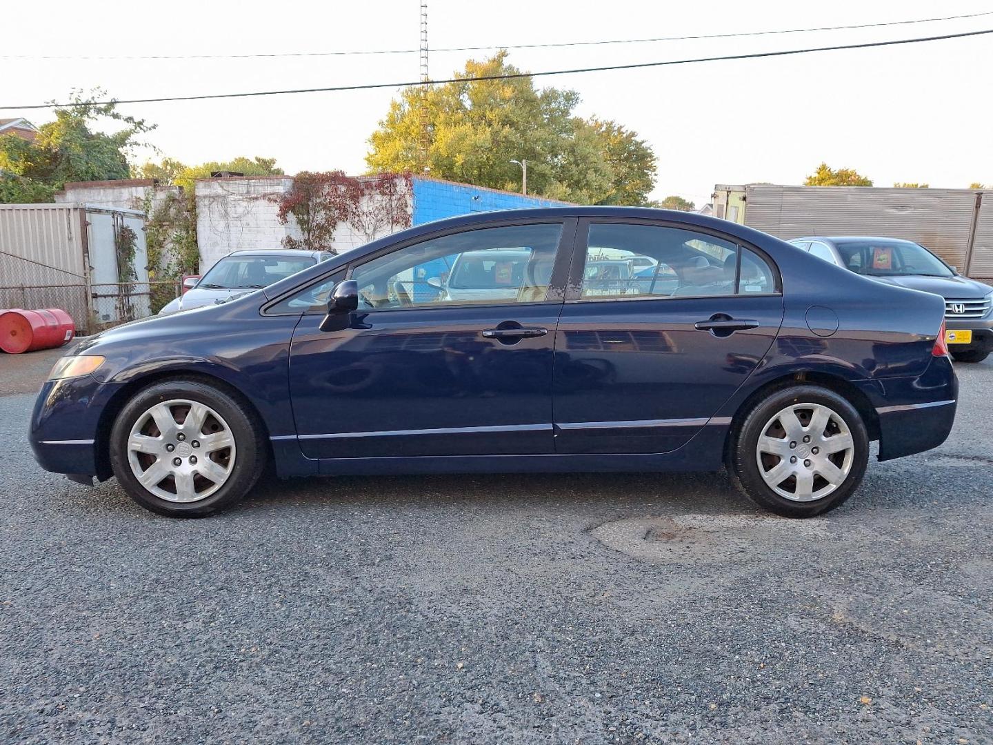 2008 Royal Blue Pearl - BL /Gray - GR Honda Civic Sdn LX (2HGFA16518H) with an 1.8L SOHC MPFI 16-valve i-VTEC I4 engine engine, located at 50 Eastern Blvd., Essex, MD, 21221, (410) 686-3444, 39.304367, -76.484947 - Presenting our stunning 2008 Honda Civic Sdn LX 4DR Auto LX, coated in a captivating blue exterior. The heart of this magnificent ride is a powerful 1.8L SOHC MPFI 16-Valve i-VTEC I4 Engine that delivers amazing performance and excellent fuel efficiency. This masterfully engineered vehicle captures - Photo#6