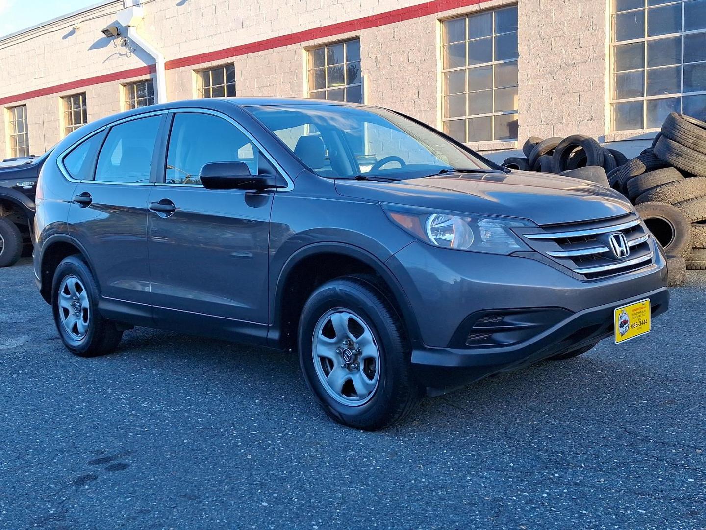 2014 Polished Metal Metallic - GX /Gray - GR Honda CR-V LX (2HKRM4H34EH) with an Engine: 2.4L I-4 16-Valve DOHC i-VTEC engine, located at 50 Eastern Blvd., Essex, MD, 21221, (410) 686-3444, 39.304367, -76.484947 - Presenting the 2014 Honda CR-V LX AWD 5DR LX, an epitome of sophistication and performance. This confident SUV, resplendent in a sleek gray exterior, promises reliable drivability under varied conditions with its advanced All-Wheel Drive system. At its heart lies an impressive 2.4L I-4 16-Valve DOHC - Photo#2