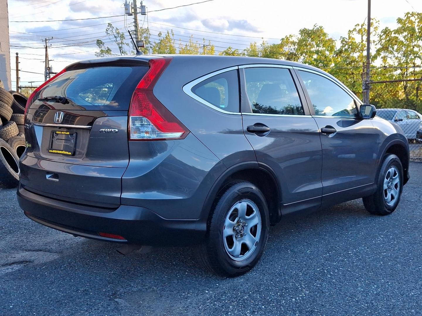 2014 Polished Metal Metallic - GX /Gray - GR Honda CR-V LX (2HKRM4H34EH) with an Engine: 2.4L I-4 16-Valve DOHC i-VTEC engine, located at 50 Eastern Blvd., Essex, MD, 21221, (410) 686-3444, 39.304367, -76.484947 - Presenting the 2014 Honda CR-V LX AWD 5DR LX, an epitome of sophistication and performance. This confident SUV, resplendent in a sleek gray exterior, promises reliable drivability under varied conditions with its advanced All-Wheel Drive system. At its heart lies an impressive 2.4L I-4 16-Valve DOHC - Photo#3