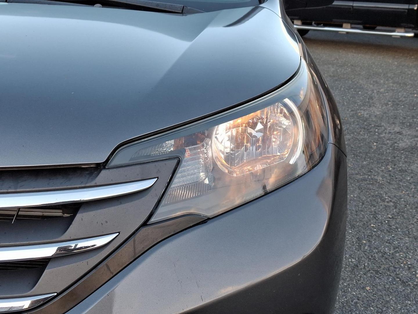 2014 Polished Metal Metallic - GX /Gray - GR Honda CR-V LX (2HKRM4H34EH) with an Engine: 2.4L I-4 16-Valve DOHC i-VTEC engine, located at 50 Eastern Blvd., Essex, MD, 21221, (410) 686-3444, 39.304367, -76.484947 - Presenting the 2014 Honda CR-V LX AWD 5DR LX, an epitome of sophistication and performance. This confident SUV, resplendent in a sleek gray exterior, promises reliable drivability under varied conditions with its advanced All-Wheel Drive system. At its heart lies an impressive 2.4L I-4 16-Valve DOHC - Photo#8