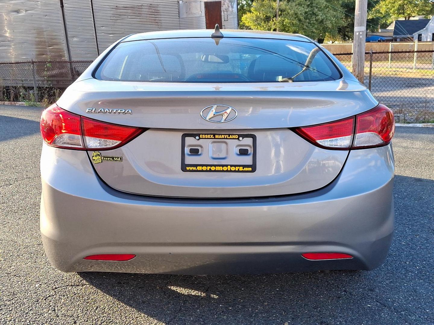 2013 Titanium Gray Metallic - N5S /Gray - RAS Hyundai Elantra GLS PZEV (KMHDH4AE6DU) with an 1.8L DOHC MPFI D-CVVT 16-valve I4 engine engine, located at 50 Eastern Blvd., Essex, MD, 21221, (410) 686-3444, 39.304367, -76.484947 - Elevate your driving experience with this sleek 2013 Hyundai Elantra GLS PZEV. Radiating an alluring sense of sophistication, it boasts a titanium gray metallic exterior complemented beautifully by a tastefully subdued gray interior. Powered by a robust 1.8L DOHC MPFI D-CVVT 16-valve I4 engine, this - Photo#4