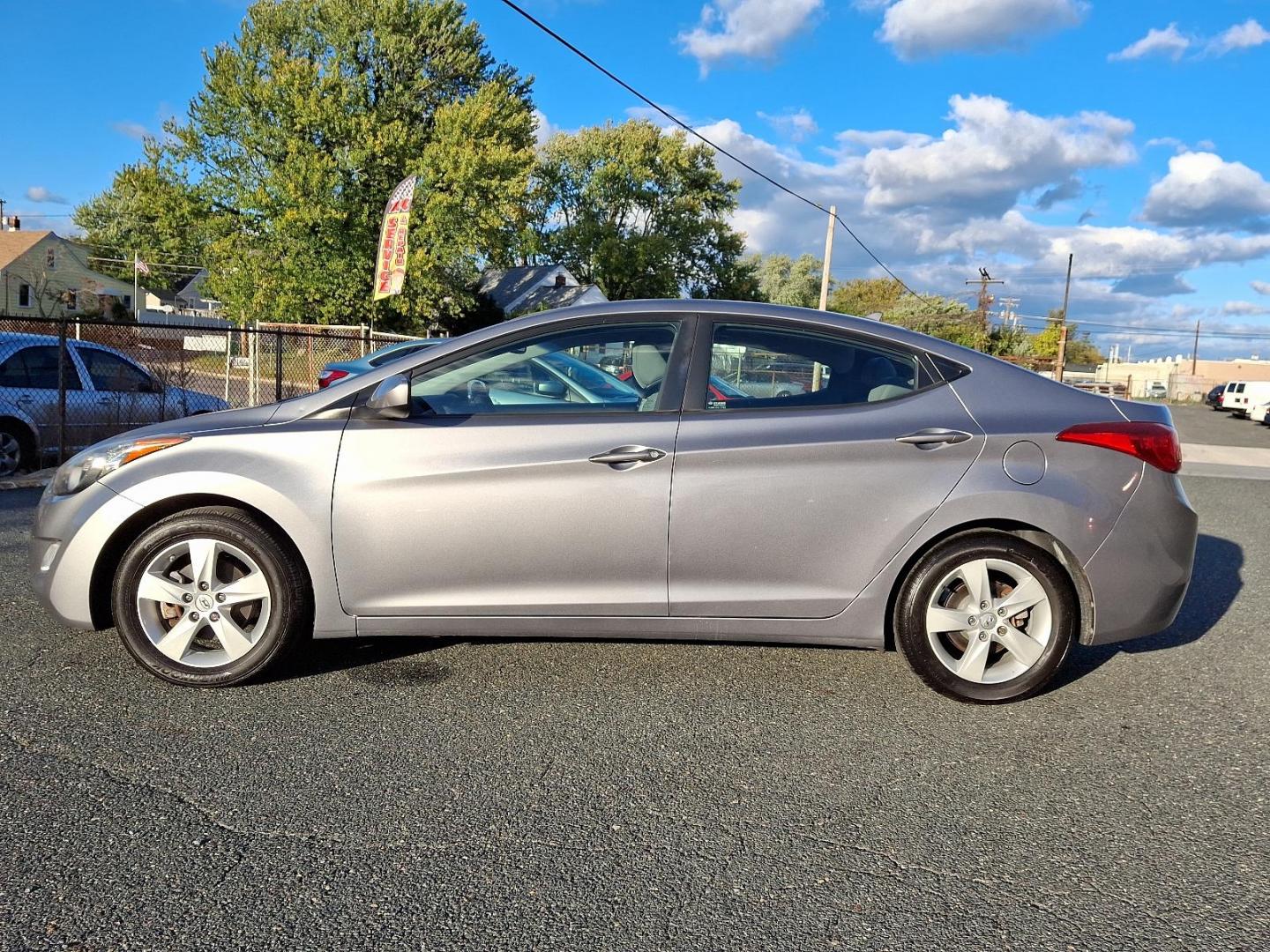 2013 Titanium Gray Metallic - N5S /Gray - RAS Hyundai Elantra GLS PZEV (KMHDH4AE6DU) with an 1.8L DOHC MPFI D-CVVT 16-valve I4 engine engine, located at 50 Eastern Blvd., Essex, MD, 21221, (410) 686-3444, 39.304367, -76.484947 - Elevate your driving experience with this sleek 2013 Hyundai Elantra GLS PZEV. Radiating an alluring sense of sophistication, it boasts a titanium gray metallic exterior complemented beautifully by a tastefully subdued gray interior. Powered by a robust 1.8L DOHC MPFI D-CVVT 16-valve I4 engine, this - Photo#6