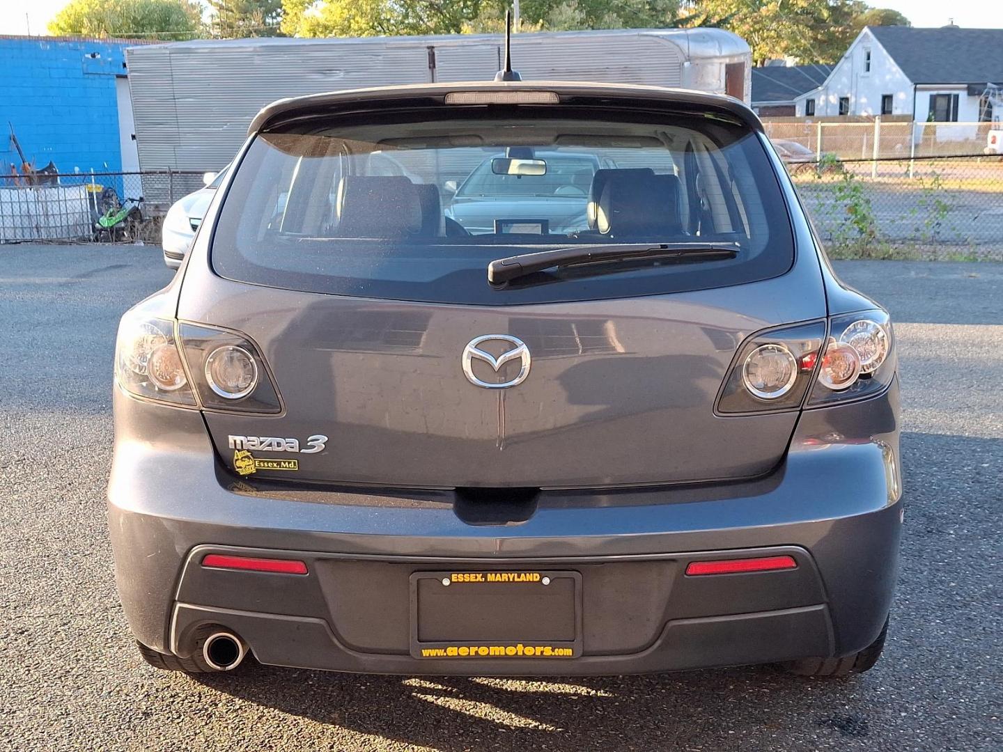 2009 Metropolitan Gray Mica - 36C /Black - BR6 Mazda MAZDA3 s Grand Touring (JM1BK343191) with an 2.3L DOHC MPFI 16-valve I4 engine w/variable valve timing (VVT), balance shafts engine, located at 50 Eastern Blvd., Essex, MD, 21221, (410) 686-3444, 39.304367, -76.484947 - Feast your eyes on this well-maintained 2009 Mazda MAZDA3 s Grand Touring, an epitome of design and functionality. This 5-door hatchback comes with an elegant metropolitan gray mica exterior complemented by a plush black interior. Under the hood, it boasts a powerful, sophisticated 2.3L DOHC MPFI 16 - Photo#4