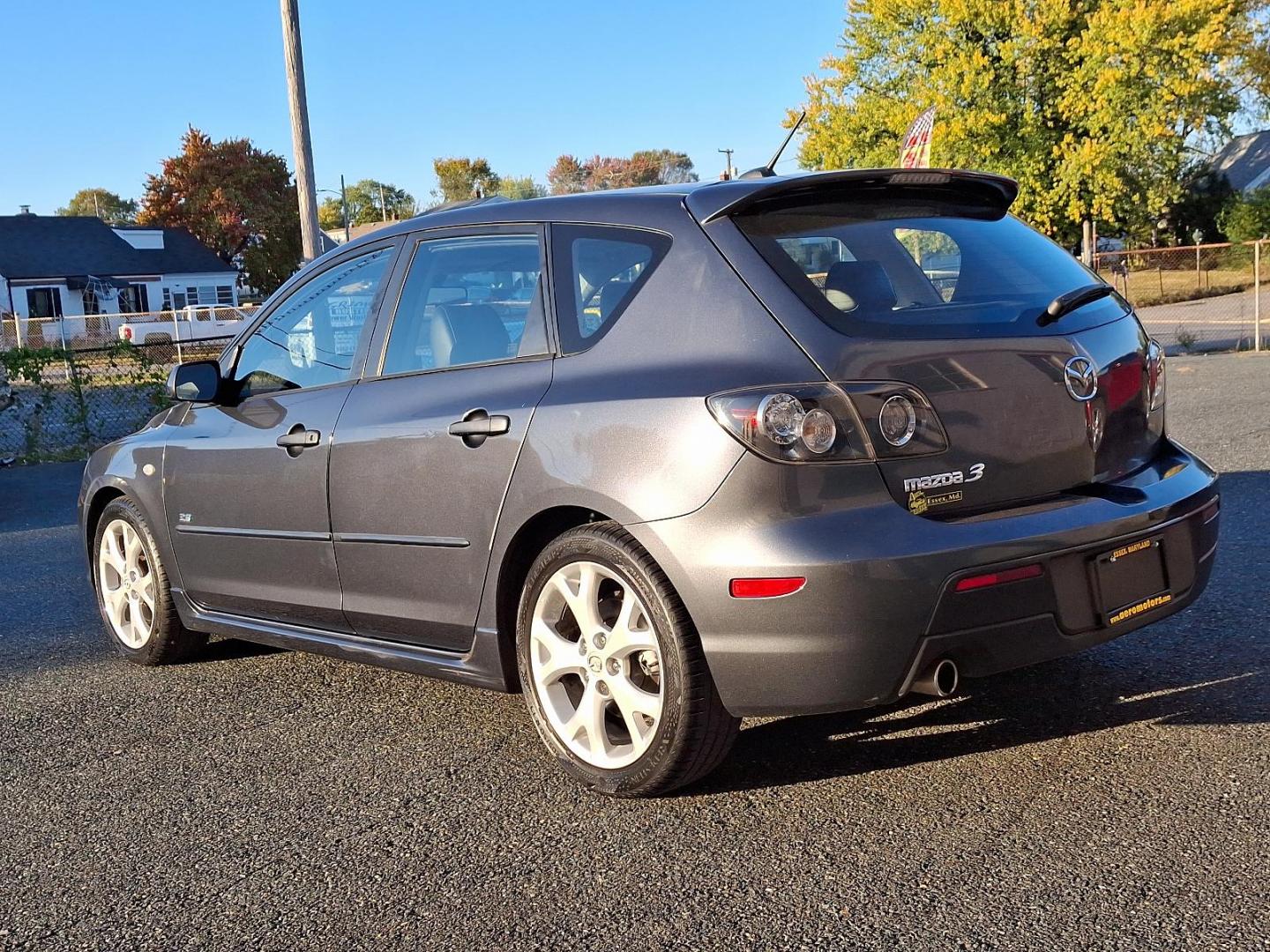 2009 Metropolitan Gray Mica - 36C /Black - BR6 Mazda MAZDA3 s Grand Touring (JM1BK343191) with an 2.3L DOHC MPFI 16-valve I4 engine w/variable valve timing (VVT), balance shafts engine, located at 50 Eastern Blvd., Essex, MD, 21221, (410) 686-3444, 39.304367, -76.484947 - Feast your eyes on this well-maintained 2009 Mazda MAZDA3 s Grand Touring, an epitome of design and functionality. This 5-door hatchback comes with an elegant metropolitan gray mica exterior complemented by a plush black interior. Under the hood, it boasts a powerful, sophisticated 2.3L DOHC MPFI 16 - Photo#5