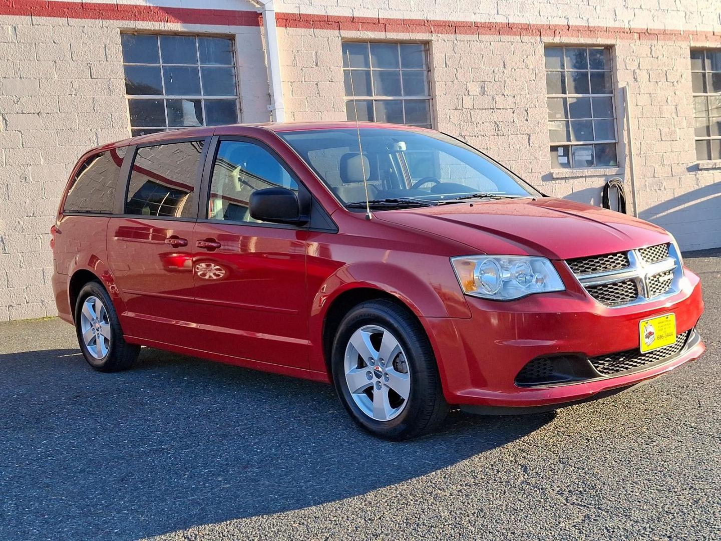 2013 Red Dodge Grand Caravan SE (2C4RDGBG3DR) with an 3.6L Pentastar 3.6L V6 283hp 260ft. lbs. Sequential-Port F.I. engine, 6-Speed Shiftable Automatic transmission, located at 50 Eastern Blvd., Essex, MD, 21221, (410) 686-3444, 39.304367, -76.484947 - Photo#26