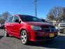 2013 Red Dodge Grand Caravan SE (2C4RDGBG3DR) with an 3.6L Pentastar 3.6L V6 283hp 260ft. lbs. Sequential-Port F.I. engine, 6-Speed Shiftable Automatic transmission, located at 50 Eastern Blvd., Essex, MD, 21221, (410) 686-3444, 39.304367, -76.484947 - Photo#7