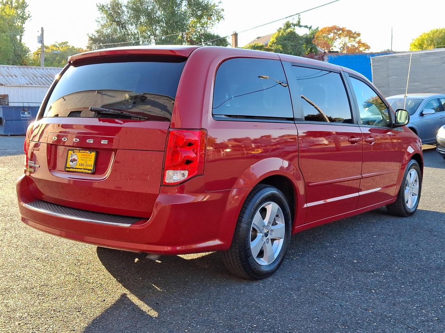 2013 Redline Two-Coat Pearl - PRM /Black/Light Graystone - H7X1 Dodge Grand Caravan SE (2C4RDGBG3DR) with an 3.6L VVT 24-VALVE V6 FLEX FUEL ENGINE engine, located at 50 Eastern Blvd., Essex, MD, 21221, (410) 686-3444, 39.304367, -76.484947 - Experience smooth and powerful cruising with this 2013 Dodge Grand Caravan SE 4dr wgn se, designed for the modern driver. This exemplary vehicle boasts a 3.6L VVT 24-valve V6 Flex Fuel engine which demonstrates superb power and efficiency. Wrapping functionality with style, the striking redline two- - Photo#3