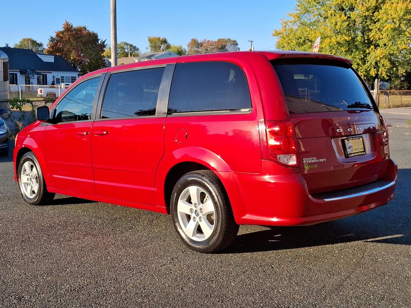 2013 Redline Two-Coat Pearl - PRM /Black/Light Graystone - H7X1 Dodge Grand Caravan SE (2C4RDGBG3DR) with an 3.6L VVT 24-VALVE V6 FLEX FUEL ENGINE engine, located at 50 Eastern Blvd., Essex, MD, 21221, (410) 686-3444, 39.304367, -76.484947 - Experience smooth and powerful cruising with this 2013 Dodge Grand Caravan SE 4dr wgn se, designed for the modern driver. This exemplary vehicle boasts a 3.6L VVT 24-valve V6 Flex Fuel engine which demonstrates superb power and efficiency. Wrapping functionality with style, the striking redline two- - Photo#5