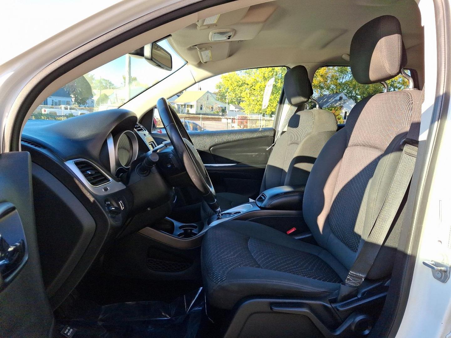 2018 Vice White - PW3 /Black - E5X9 Dodge Journey SE (3C4PDCAB7JT) with an ENGINE: 2.4L I4 DOHC 16V DUAL VVT engine, located at 50 Eastern Blvd., Essex, MD, 21221, (410) 686-3444, 39.304367, -76.484947 - Feast your eyes on the stunning 2018 Dodge Journey SE in a striking Vice White exterior, enhanced by a sleek black interior. This front-wheel-drive vehicle is powered by a robust 2.4L I4 DOHC 16V Dual VVT engine, promising an impressive performance on the road. The Journey SE embodies refined mechan - Photo#13