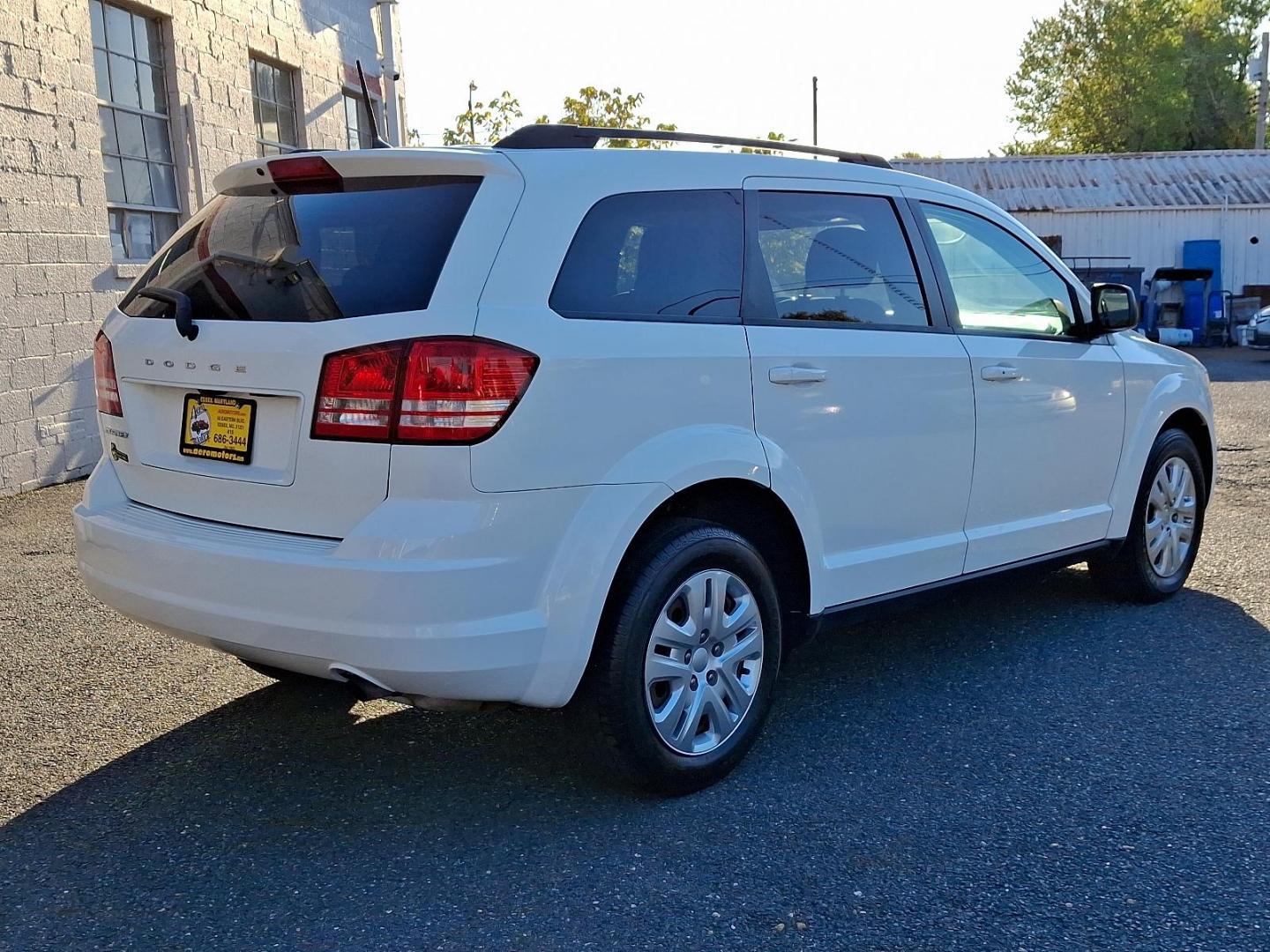 2018 Vice White - PW3 /Black - E5X9 Dodge Journey SE (3C4PDCAB7JT) with an ENGINE: 2.4L I4 DOHC 16V DUAL VVT engine, located at 50 Eastern Blvd., Essex, MD, 21221, (410) 686-3444, 39.304367, -76.484947 - Feast your eyes on the stunning 2018 Dodge Journey SE in a striking Vice White exterior, enhanced by a sleek black interior. This front-wheel-drive vehicle is powered by a robust 2.4L I4 DOHC 16V Dual VVT engine, promising an impressive performance on the road. The Journey SE embodies refined mechan - Photo#3