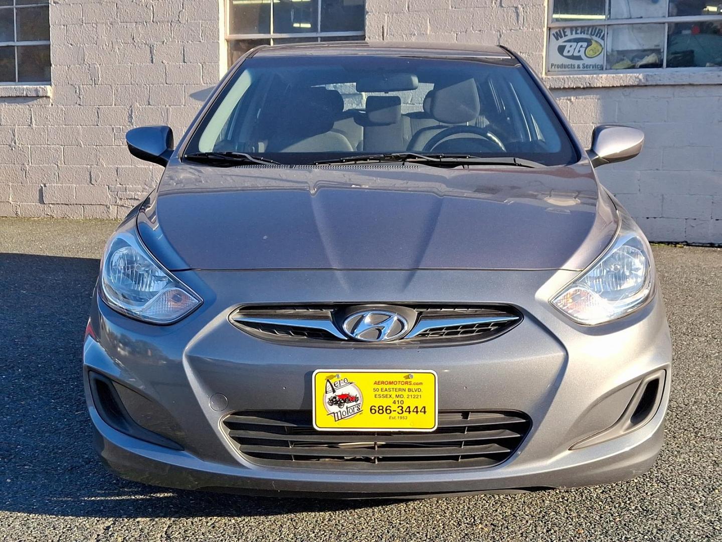 2014 Triathlon Gray Metallic - N9S /Black - RY Hyundai Accent GS (KMHCT5AEXEU) with an Engine: 1.6L DOHC 16-Valve I-4 GDI -inc: Dual Continuously Variable Valve Timing (D-CVVT), variable induction system and aluminum block and head engine, located at 50 Eastern Blvd., Essex, MD, 21221, (410) 686-3444, 39.304367, -76.484947 - Showcasing a stylish 2014 Hyundai Accent GS 5-Door HB Auto GS, finished in an upscale Triathlon Gray Metallic exterior complimented by a sleek Black interior. This compact car is equipped with a robust 1.6L DOHC 16-valve I-4 GDI engine, featuring dual continuously variable valve timing (D-CVVT) for - Photo#1