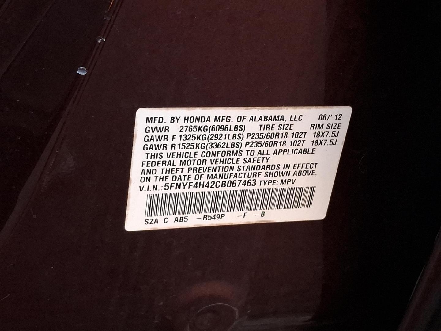 2012 Dark Cherry Pearl II - RX /Beige - BE Honda Pilot EX (5FNYF4H42CB) with an 3.5L SOHC MPFI 24-valve i-VTEC V6 engine engine, located at 50 Eastern Blvd., Essex, MD, 21221, (410) 686-3444, 39.304367, -76.484947 - Presenting a stunning 2012 Honda Pilot EX 4WD 4DR EX cloaked in a captivating maroon color for a unique style statement. This spectacular ride seats seven, ensuring comfort and space for family and friends. At its heart, the Pilot runs on a robust 3.5L SOHC MPFI 24-valve i-VTEC V6 engine, combining - Photo#27