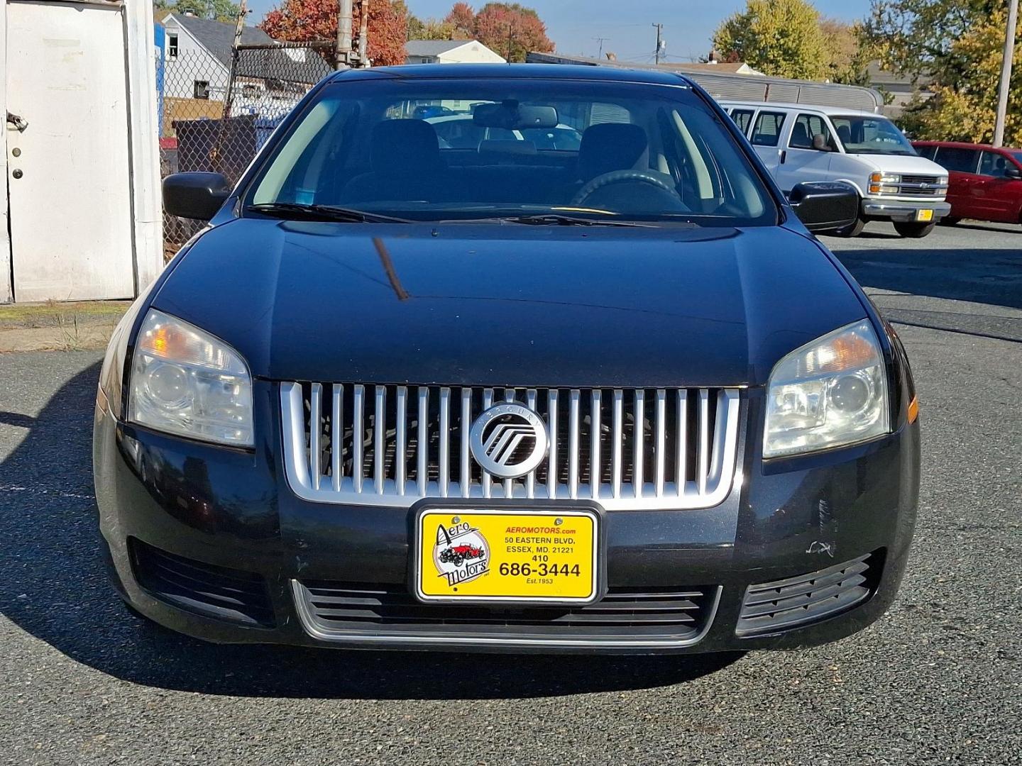 2009 Tuxedo Black Metallic - UH /Dark Charcoal - EW Mercury Milan (3MEHM07Z39R) with an 2.3L DOHC DURATEC I4 ENGINE engine, located at 50 Eastern Blvd., Essex, MD, 21221, (410) 686-3444, 39.304367, -76.484947 - Experience the right balance of style and performance with this 2009 Mercury Milan 4dr Sdn I4 FWD. Sporting a sleek black exterior, this vehicle delivers a sharp, commanding presence on the road. The heart of this Milan is its 2.3L DOHC Duratec I4 engine, designed for optimal performance and efficie - Photo#1