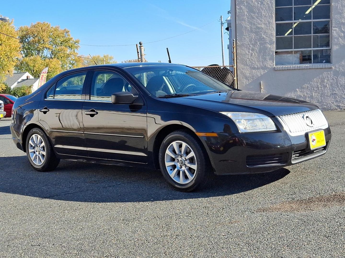 2009 Black Mercury Milan I-4 (3MEHM07Z39R) with an 2.3L 4 Cylinder Sequential-Port F.I. engine, Automatic transmission, located at 50 Eastern Blvd., Essex, MD, 21221, (410) 686-3444, 39.304367, -76.484947 - Photo#2