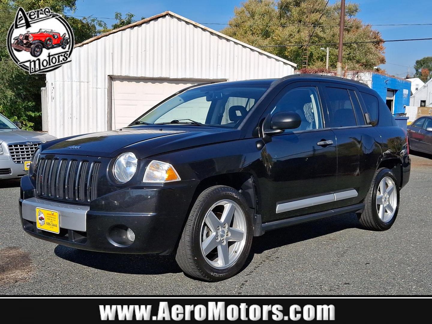 2008 Brilliant Blk Crystal Pearl - PXR /Dark Slate Gray - DV Jeep Compass Limited (1J8FT57W08D) with an 2.4L DOHC 16V I4 DUAL VVT ENGINE engine, located at 50 Eastern Blvd., Essex, MD, 21221, (410) 686-3444, 39.304367, -76.484947 - Discover the thrill of navigating any terrain with this robust 2008 Jeep Compass Limited FWD 4DR Limited. Dressed in a brilliant black crystal pearl exterior that complements its dark slate gray interior, this vehicle stands as a model of Jeep's commitment to durability and aesthetics. Powered by a - Photo#0