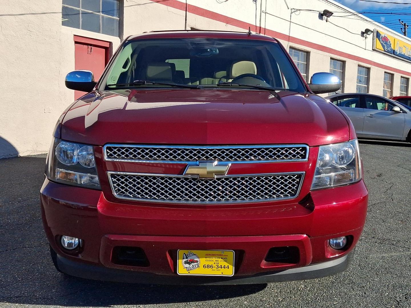 2009 Red Jewel Tintcoat - 80U /Light Cashmere/Dark Cashmere - 336 Chevrolet Tahoe LTZ (1GNFK33009J) with an ENGINE, VORTEC 5.3L V8 SFI FLEXFUEL engine, located at 50 Eastern Blvd., Essex, MD, 21221, (410) 686-3444, 39.304367, -76.484947 - Presenting an exquisite 2009 Chevrolet Tahoe LTZ 4WD 4dr 1500 LTZ that combines strength and style. Dressed in a sumptuous Red Jewel Tintcoat exterior paired with a tasteful Light Cashmere/Dark Cashmere interior, this SUV is a sight to behold. Under the hood, it boasts a powerful Vortec 5.3L V8 SFI - Photo#1