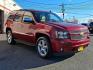 2009 Red Jewel Tintcoat - 80U /Light Cashmere/Dark Cashmere - 336 Chevrolet Tahoe LTZ (1GNFK33009J) with an ENGINE, VORTEC 5.3L V8 SFI FLEXFUEL engine, located at 50 Eastern Blvd., Essex, MD, 21221, (410) 686-3444, 39.304367, -76.484947 - Presenting an exquisite 2009 Chevrolet Tahoe LTZ 4WD 4dr 1500 LTZ that combines strength and style. Dressed in a sumptuous Red Jewel Tintcoat exterior paired with a tasteful Light Cashmere/Dark Cashmere interior, this SUV is a sight to behold. Under the hood, it boasts a powerful Vortec 5.3L V8 SFI - Photo#2